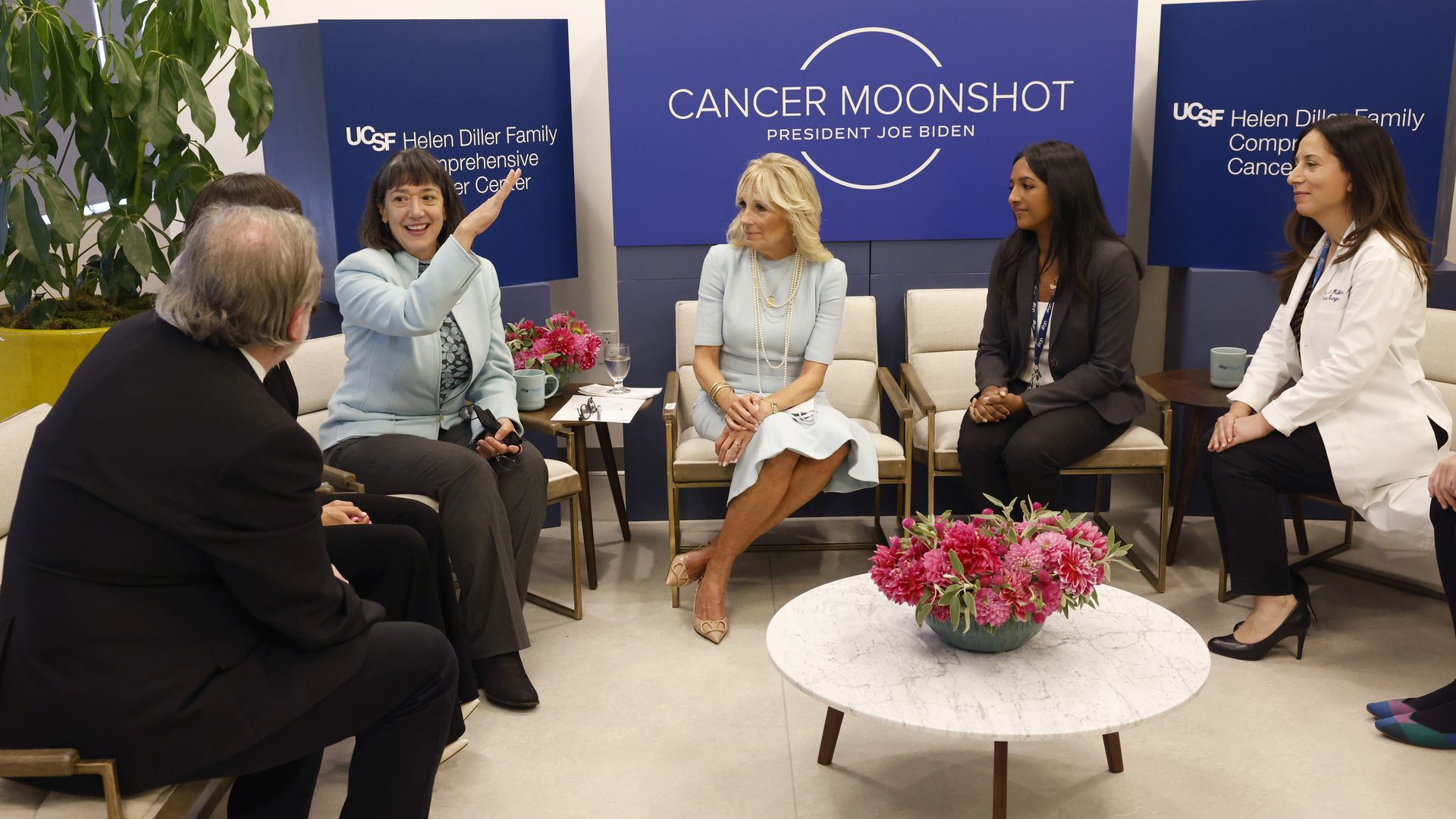 Monica Bertagnolli talks and gestures while Jill Biden looks on at a Cancer Moonshot event