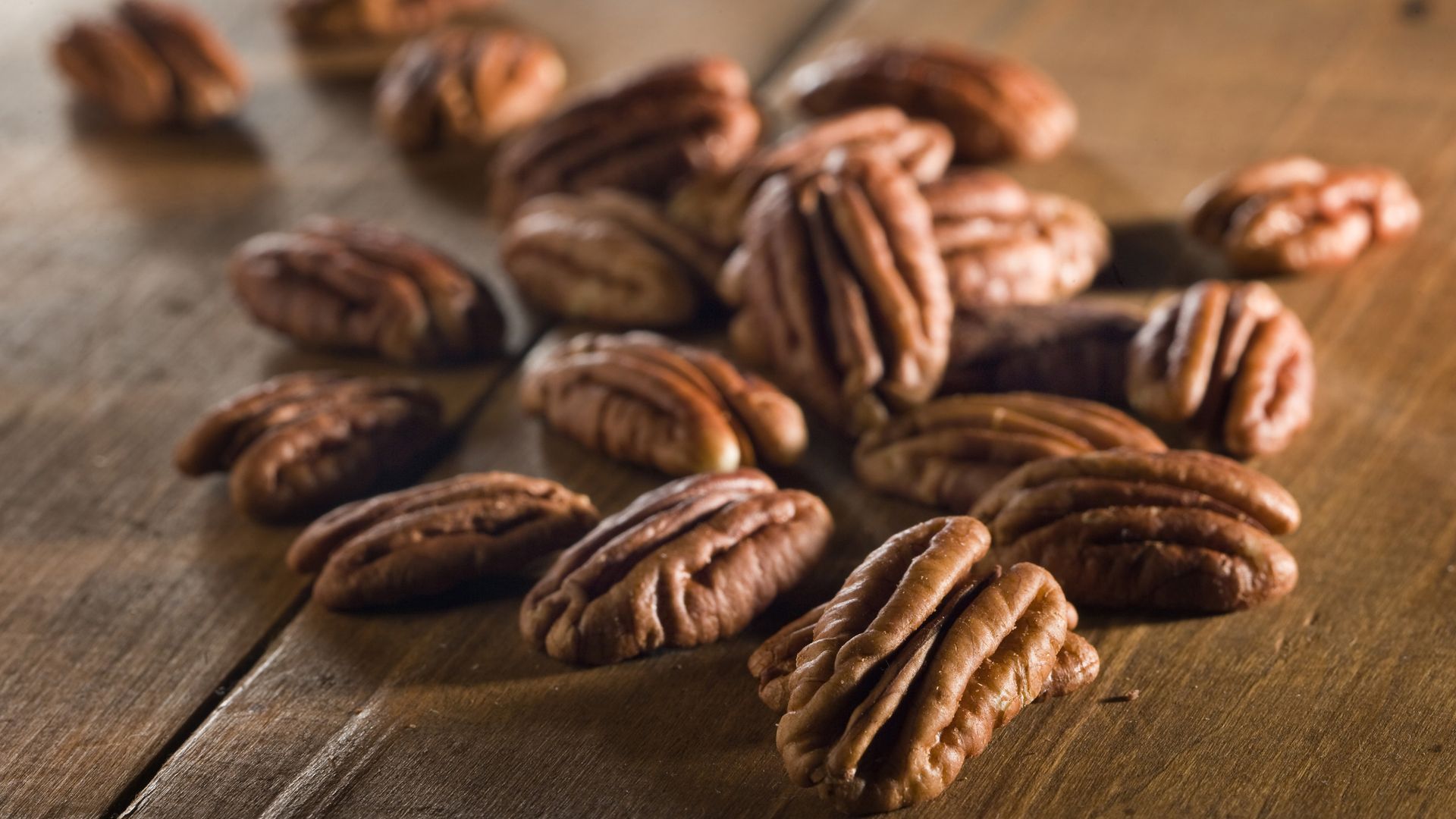 Shelled pecans on a table.