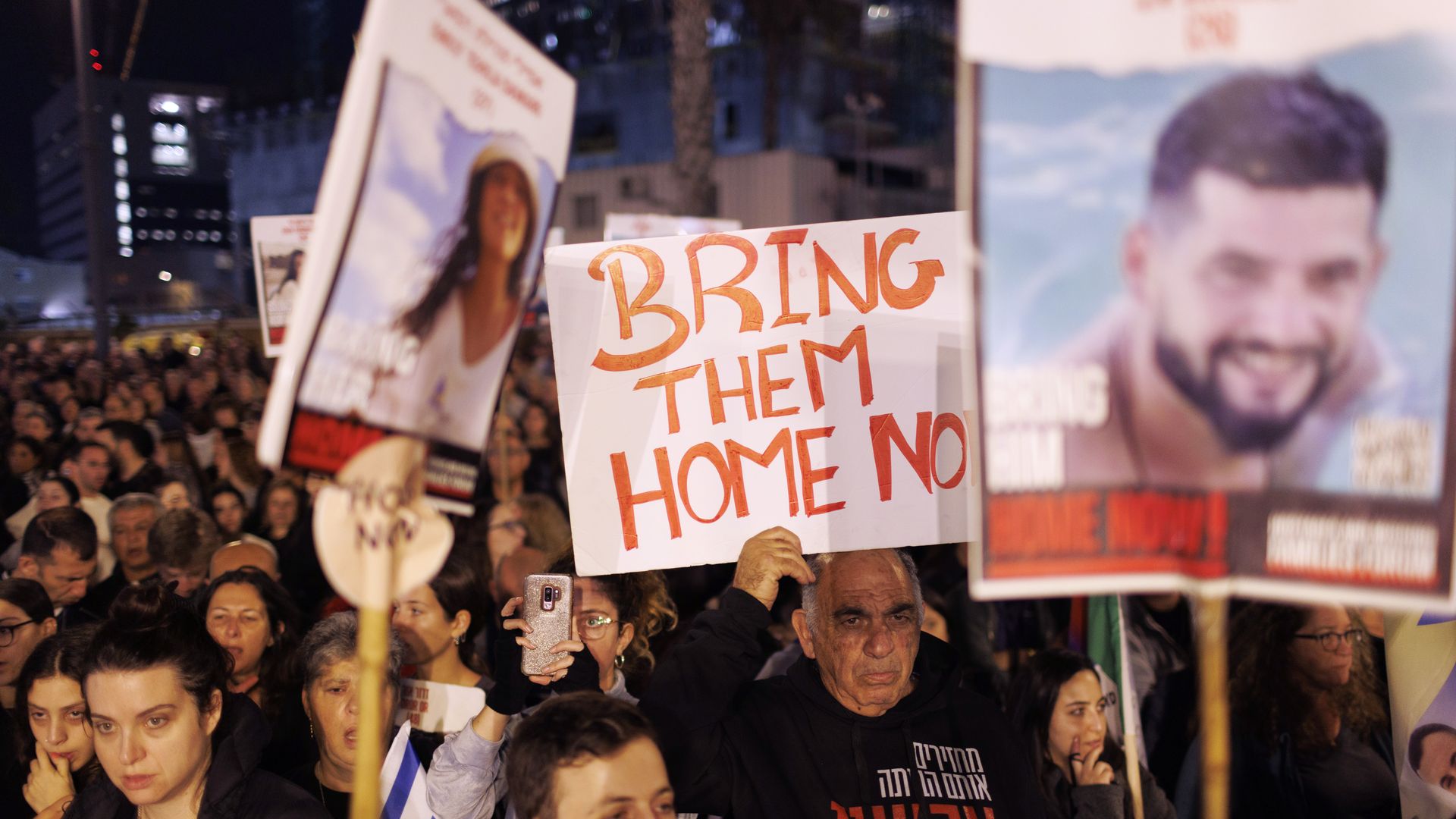 Demonstrators during a rally demanding the release of hostages held by Hamas operatives in Tel Aviv, Israel