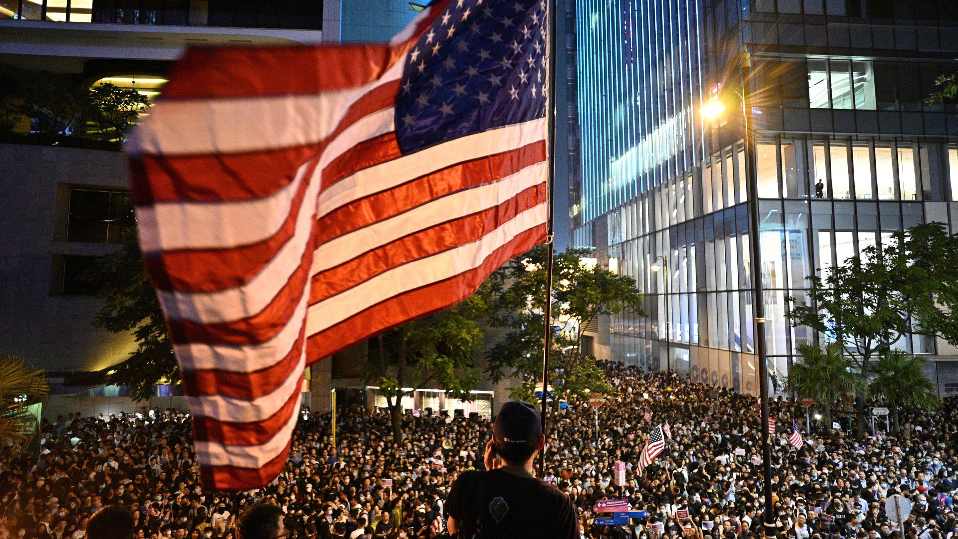 Hong Kong protestors wave US flag