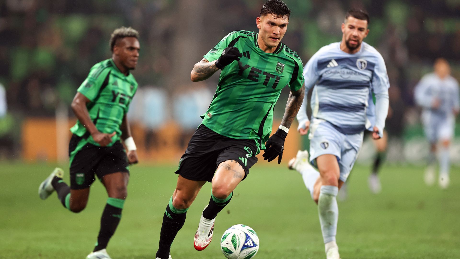 Brandon Vazquez dribbling the ball in a match.