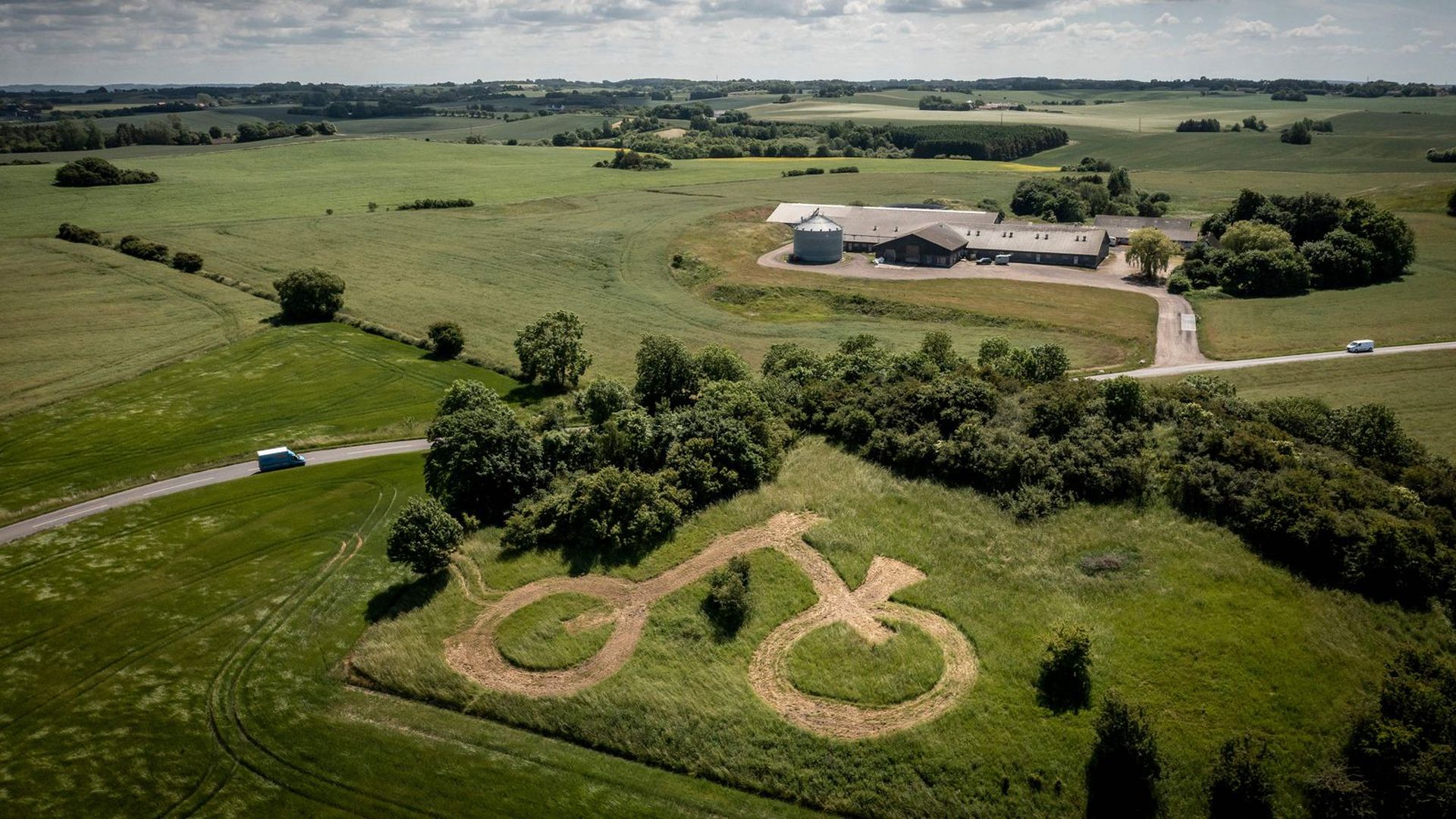 A bicycle mown into a field along the route of the second stage near Copenhagen.