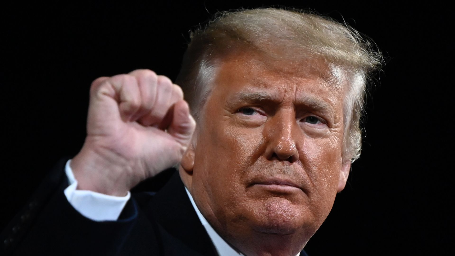 Donald Trump raises his fist