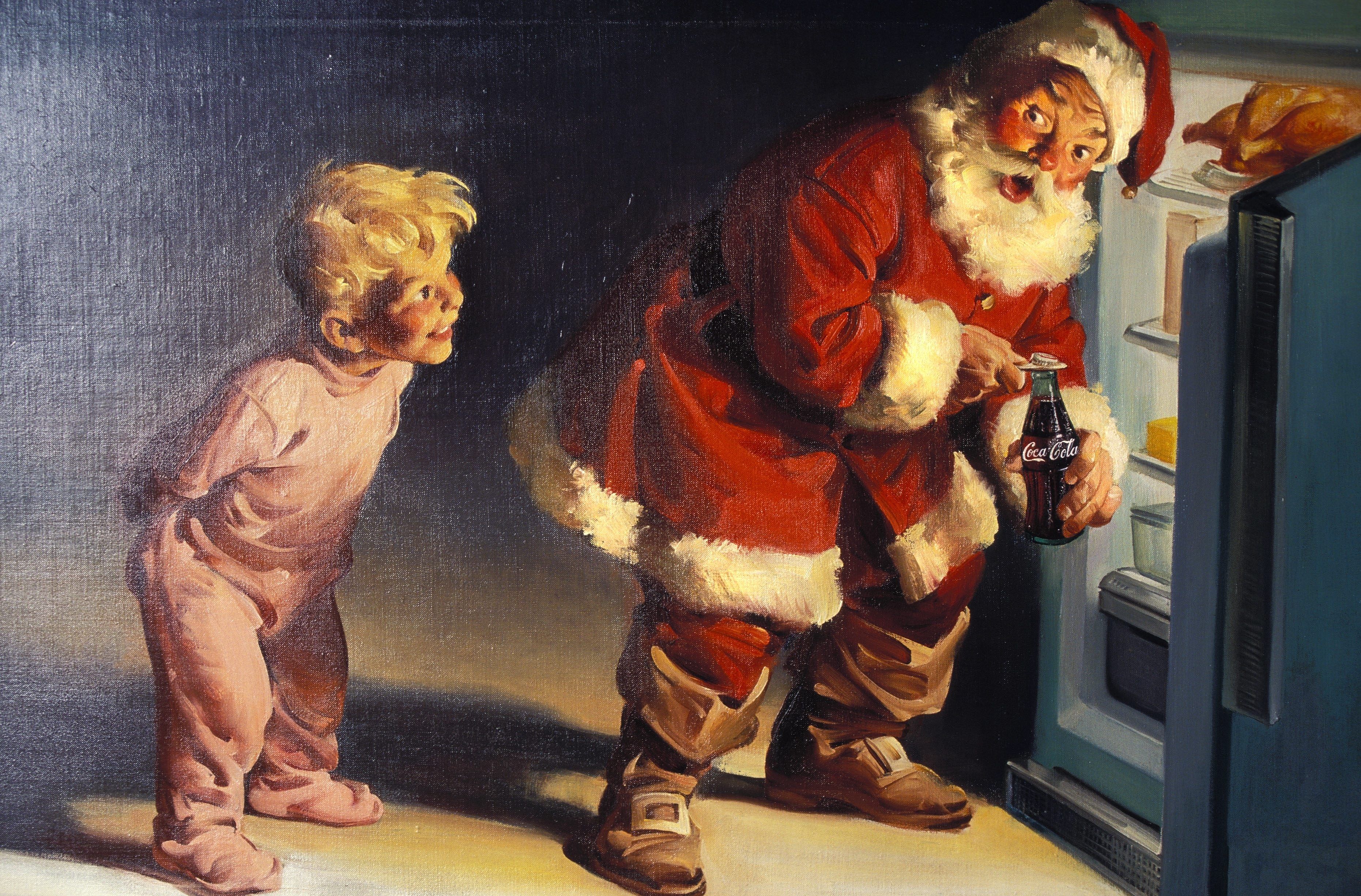 Santa opening a coke.