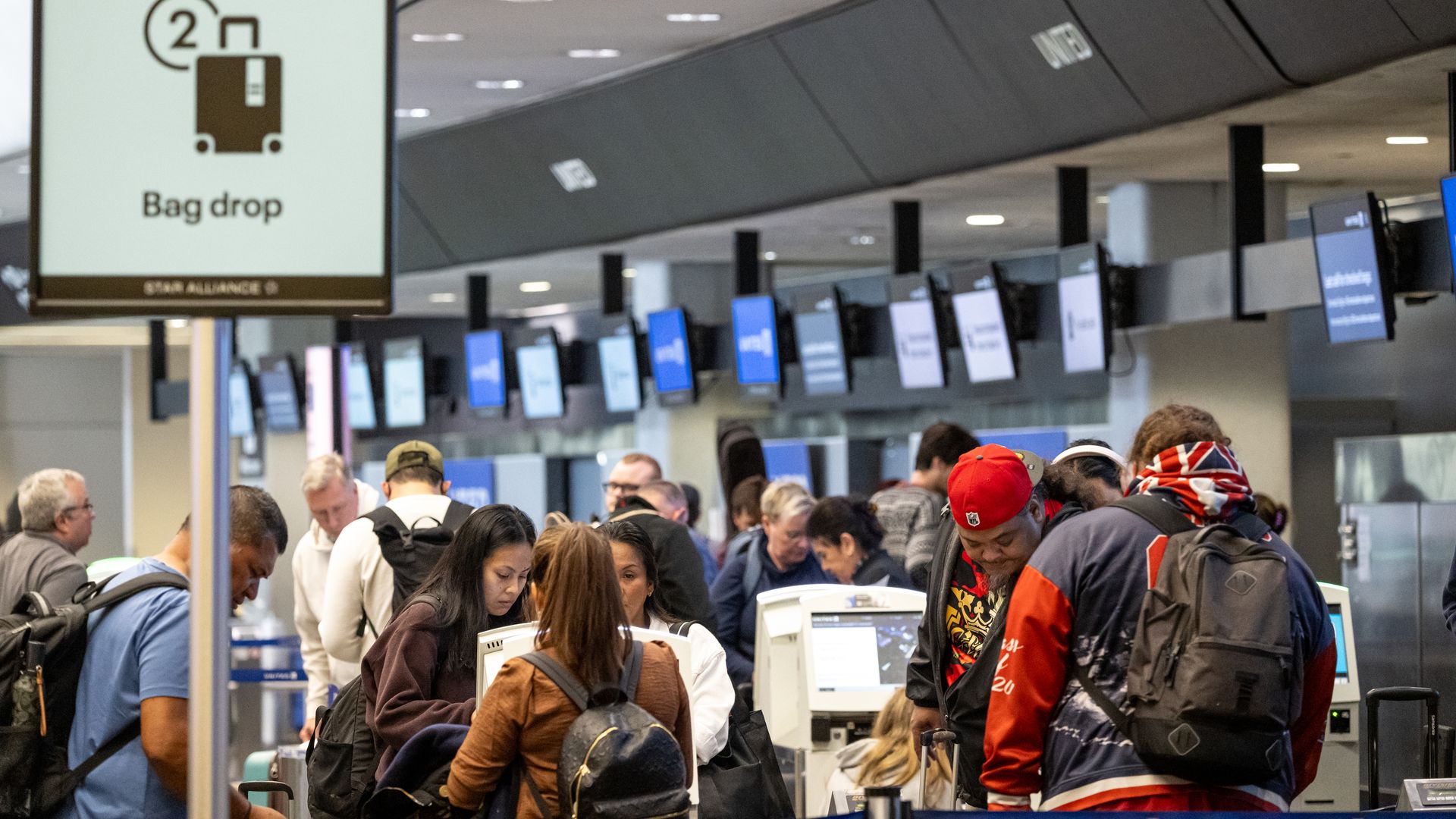 Customers waiting in line for an airline check in