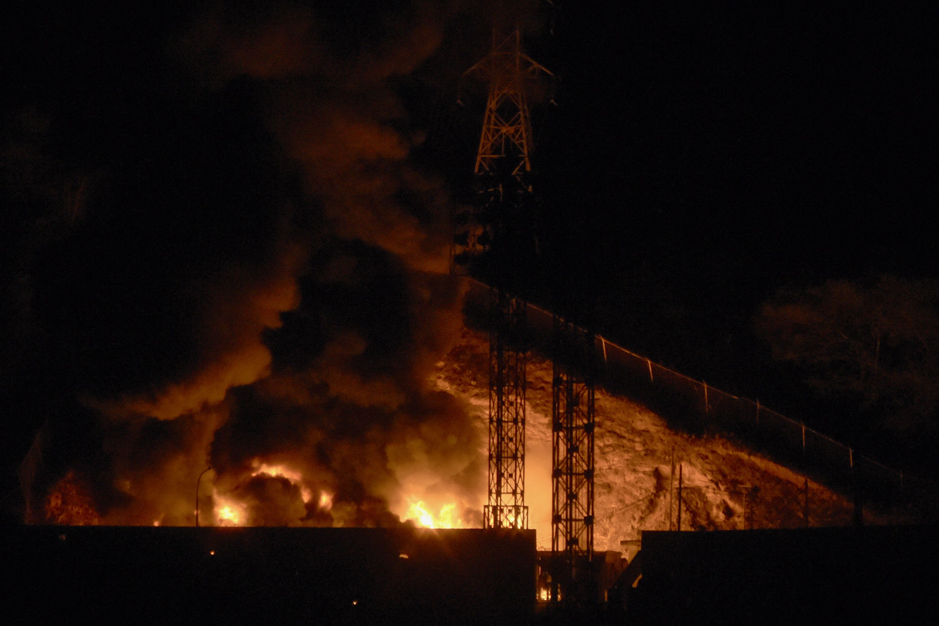 Picture of fire at Fuerte Tiuna, Venezuela's largest military complex, after a series of explosions in Caracas on January 3, 2026. Loud explosions, accompanied by sounds resembling aircraft flyovers, were heard in Caracas around 2:00 am (0600 GMT) on January 3, an AFP journalist reported. The explos