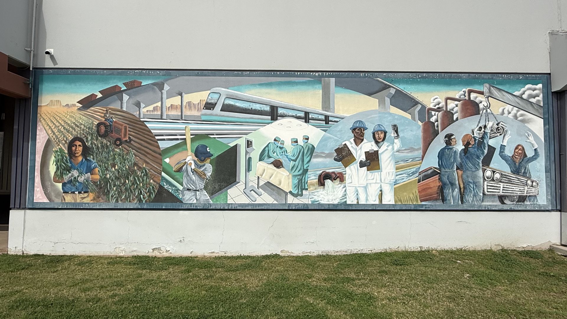 Vibrant mural depicting a farmer with crops and a tractor; a baseball player up to bat; a train and hospital scene with doctors; two people in blue helmets, which coats and pants and clipboards in front of a water pipe, with one holding a beaker; and factory workers with a car and smokestacks.