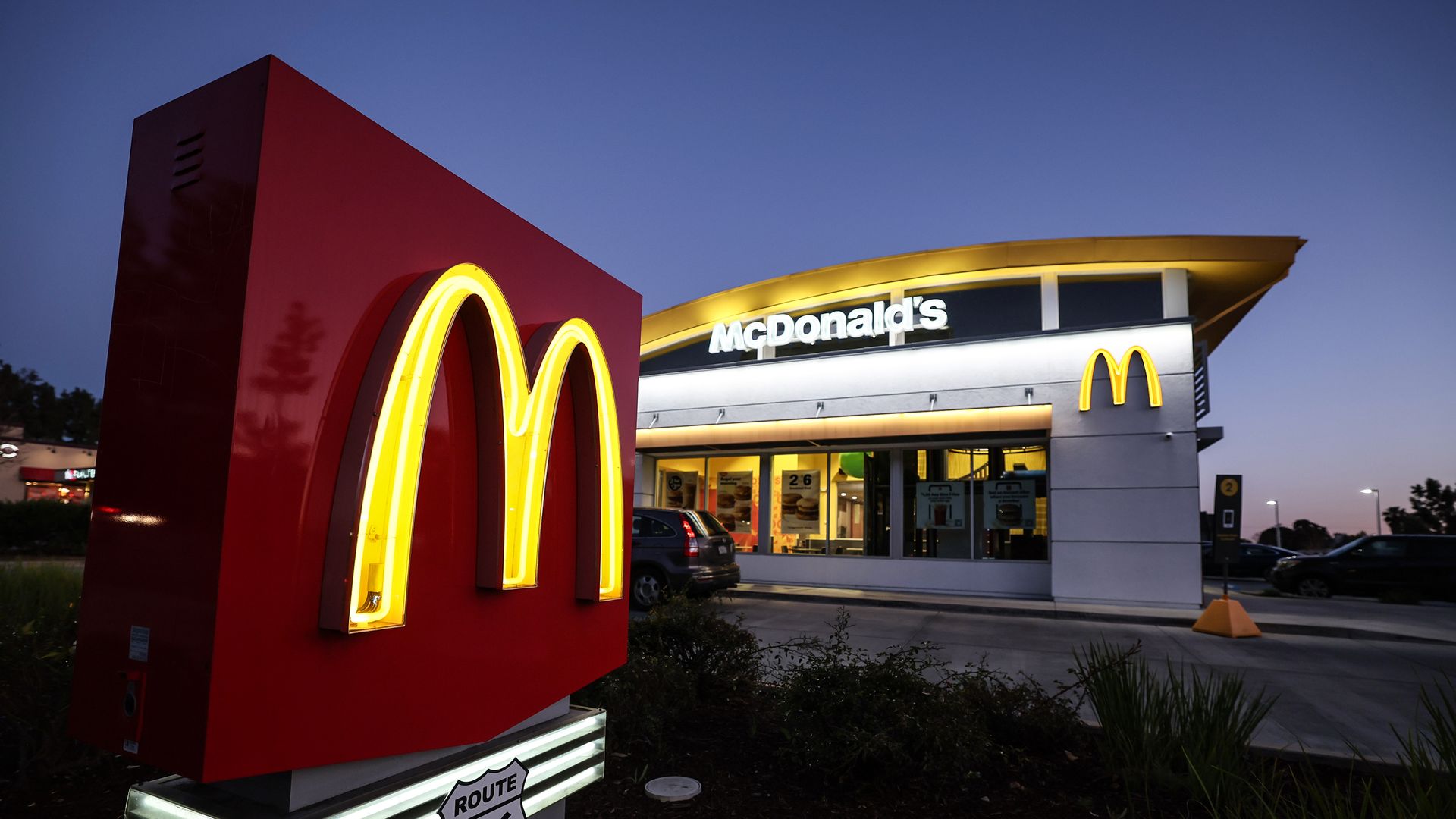 McDonald's restaurant exterior with a sign with McDonald's M logo