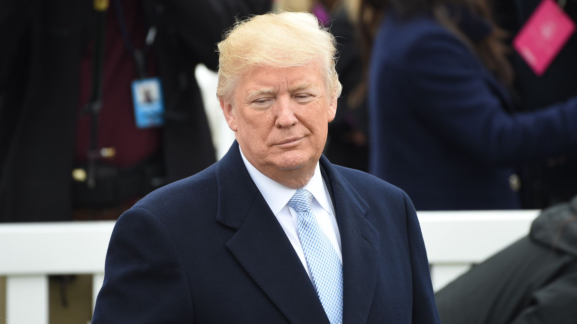 Trump holding a gold whistle