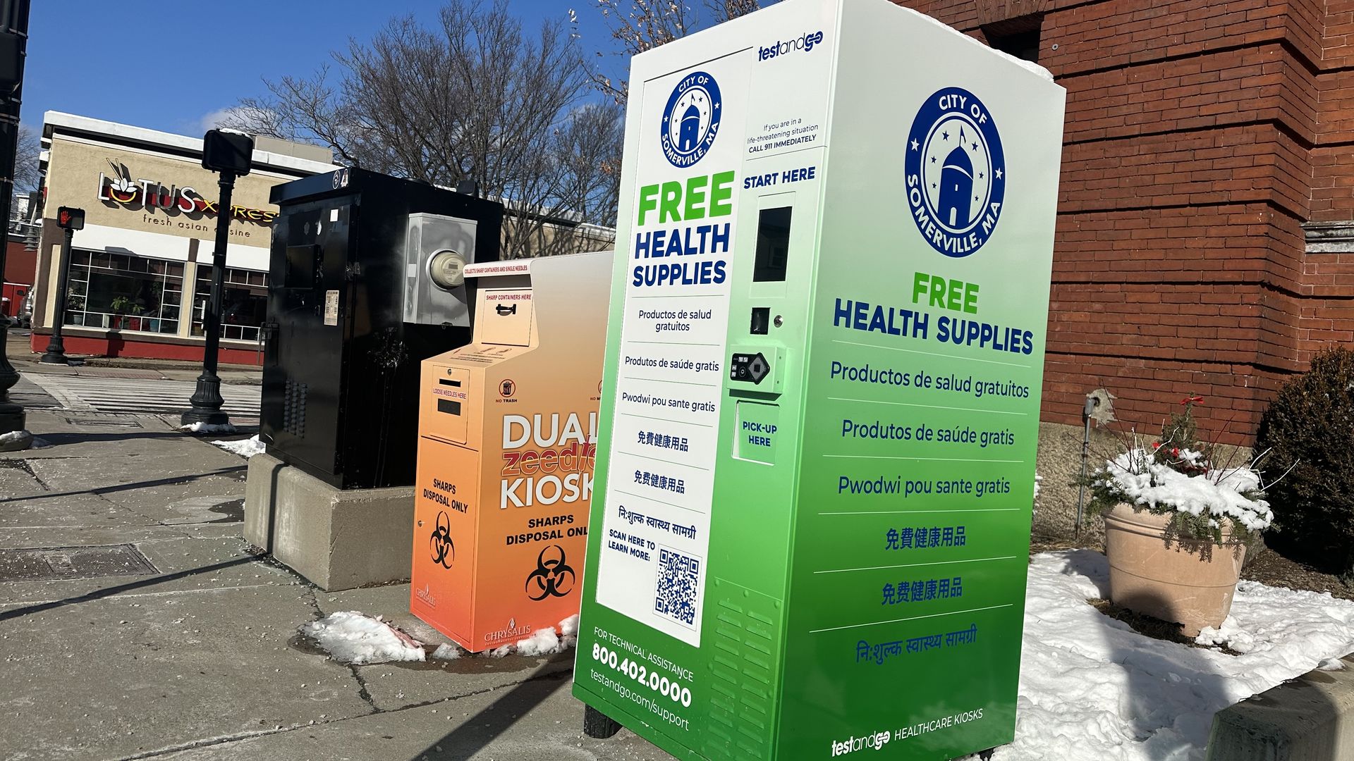 A public health vending machine that distributes free health supplies stands on Broadway in Somerville. 