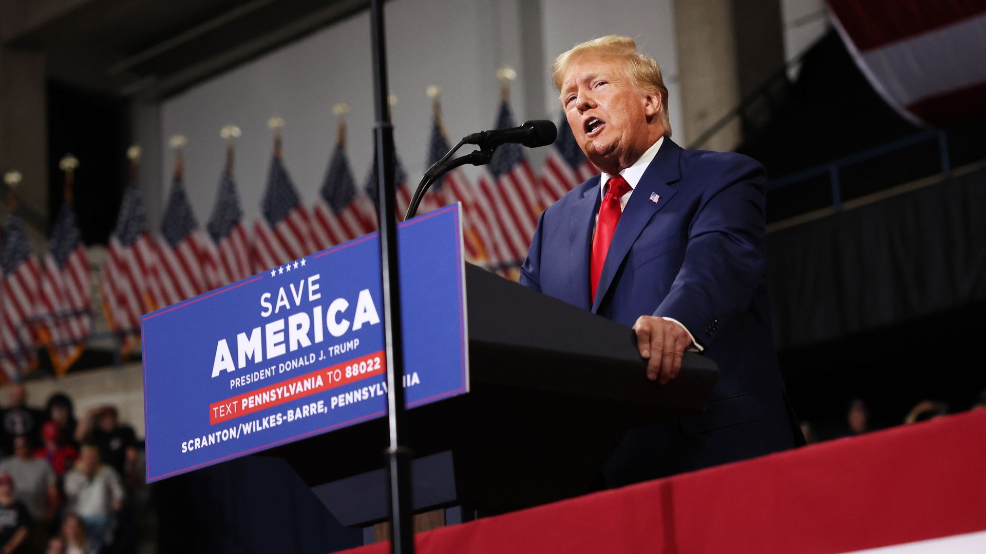 Donald Trump speaks to supporters at a rally 