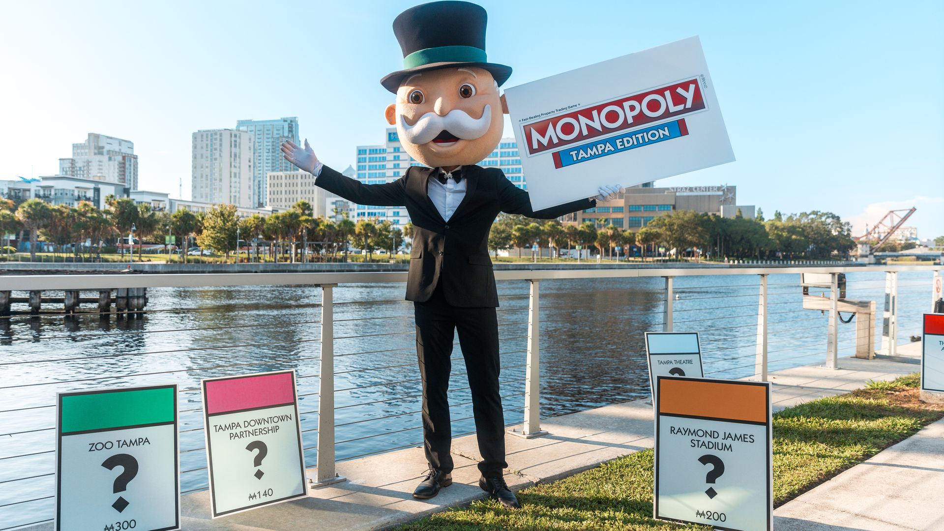 An image of Rich Uncle Pennybags of the Monopoly game outside of the riverwalk. 