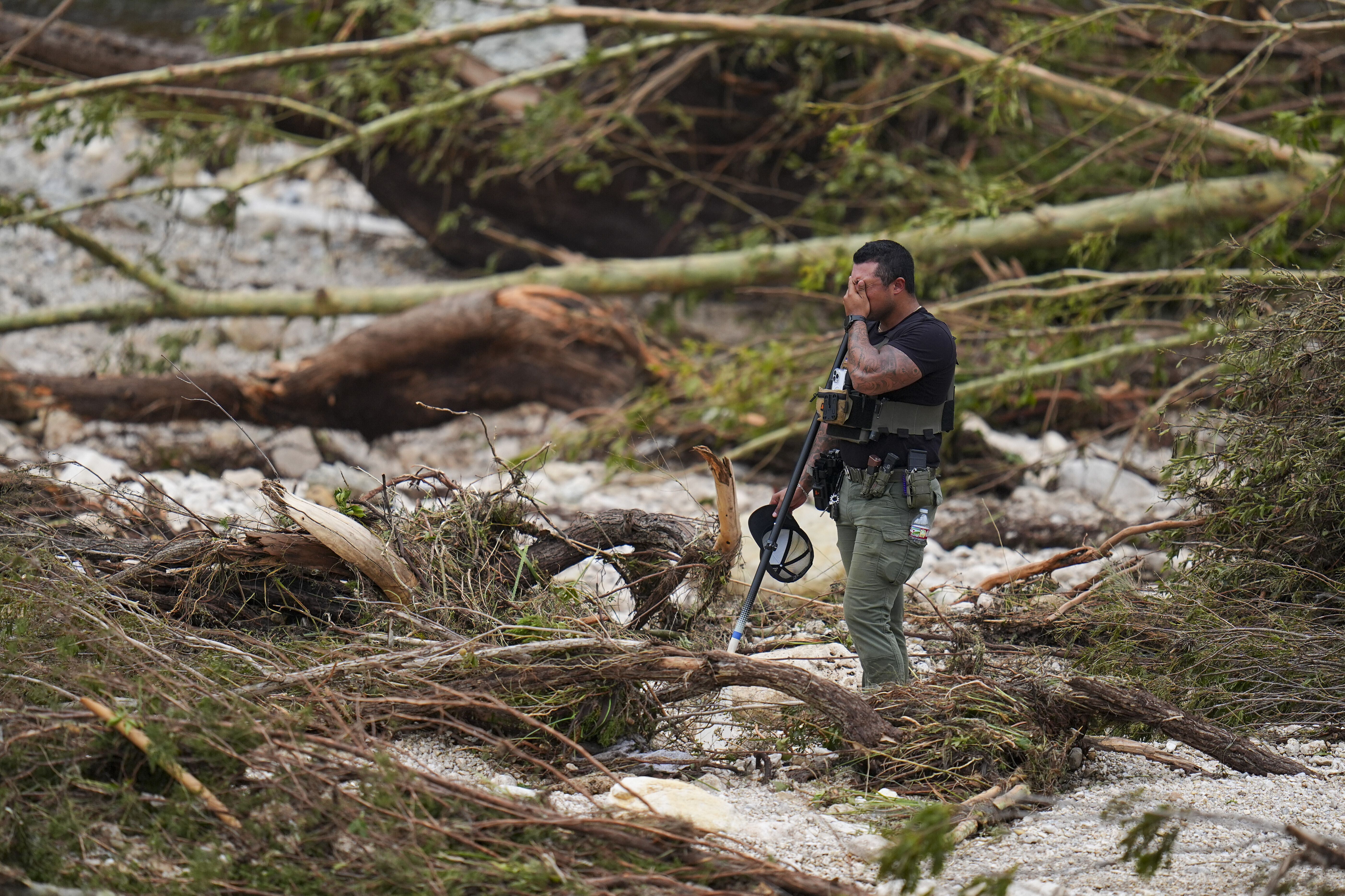 Officer surveys damage