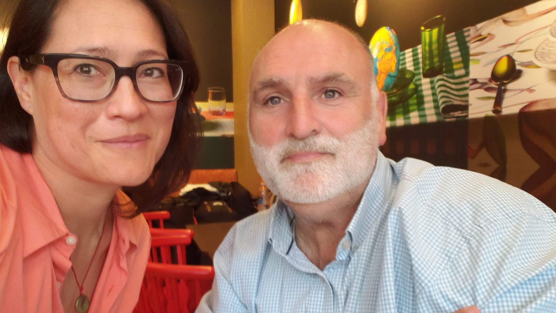 Photo of two people taking a selfie. 