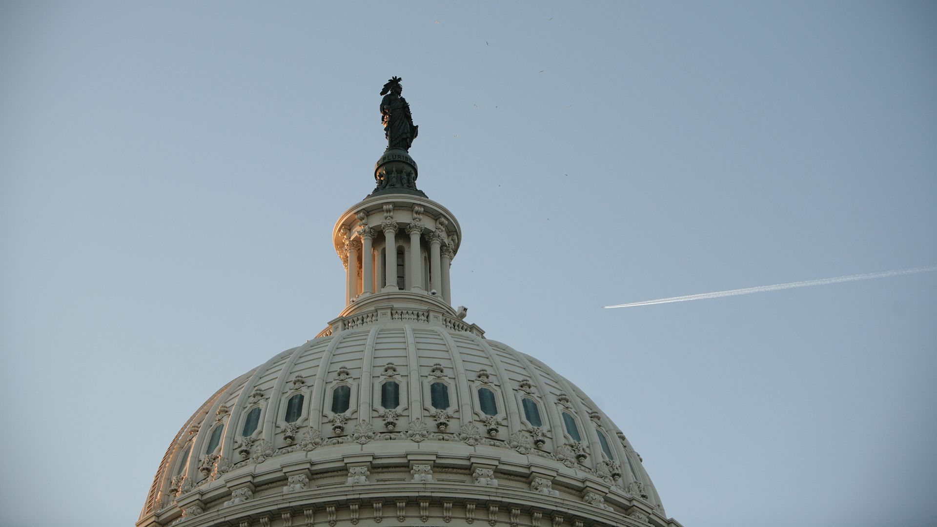 This image is a close-up of the very top of the US Capitol building.
