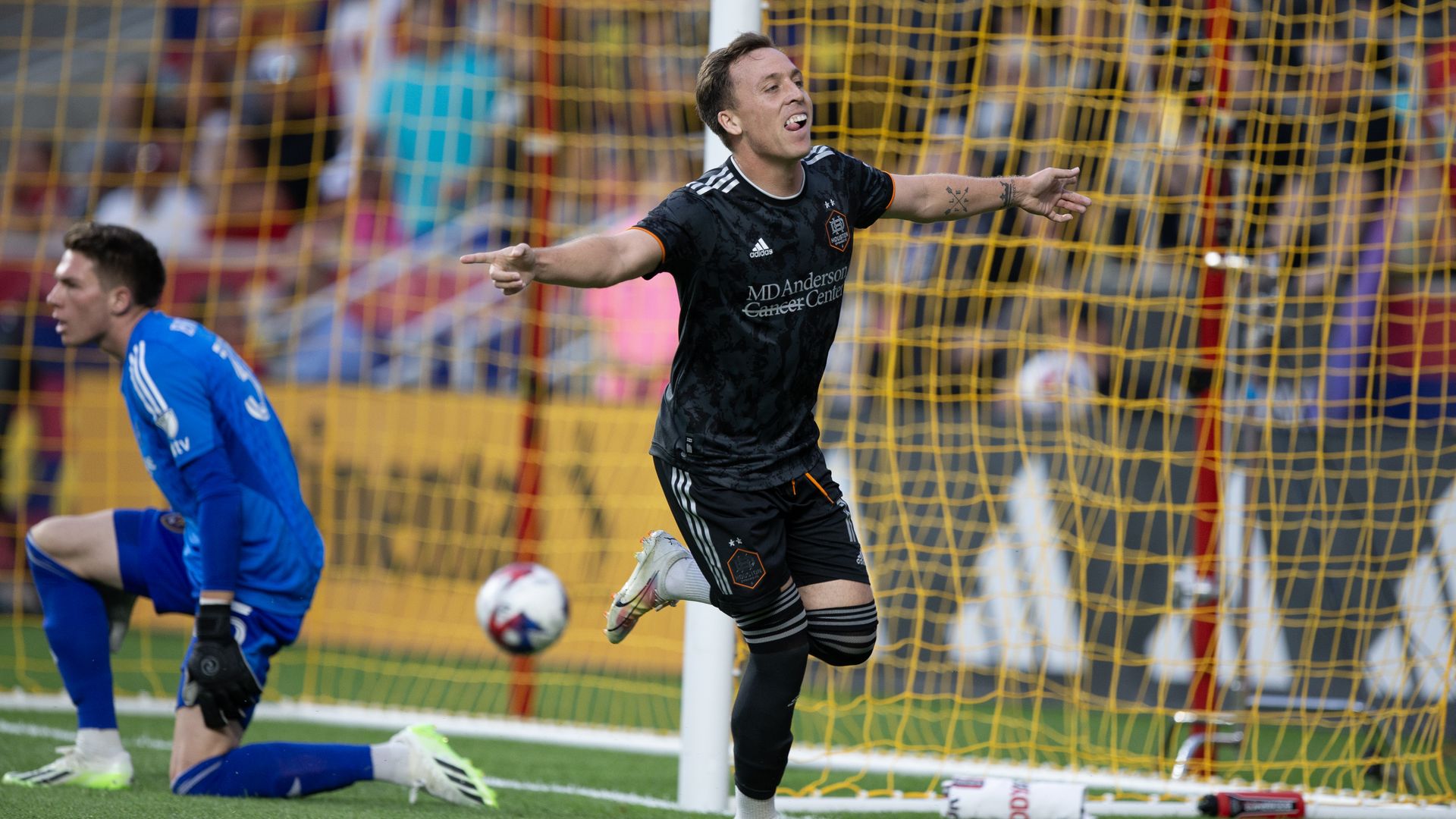 Corey Baird #11 of the Houston Dynamo celebrates scoring a goal against Real Salt Lake