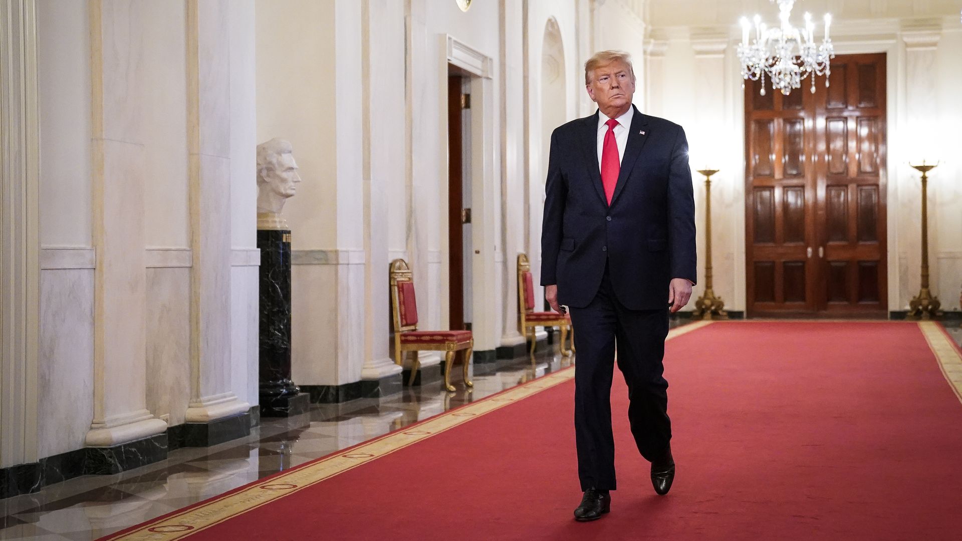 Trump walking toward the East Room