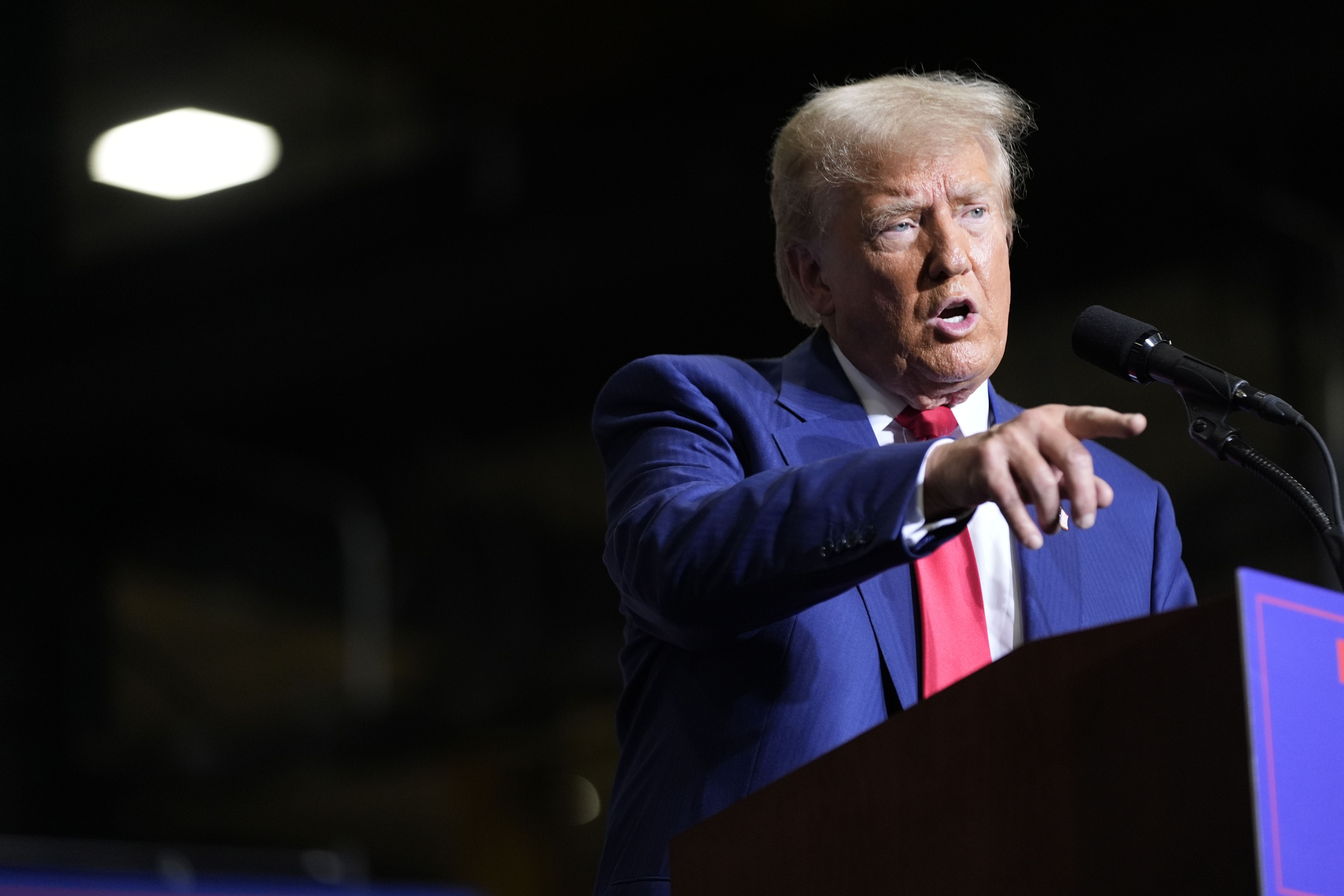 Former President Donald Trump speaks during a campaign event at Alro Steel in Potterville, Mich., yesterday.