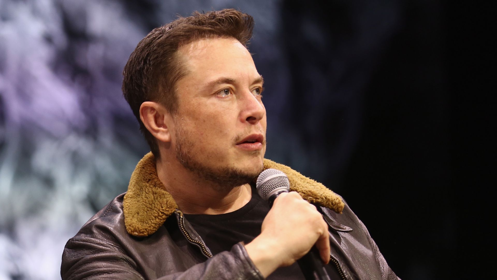  Elon Musk speaks onstage 