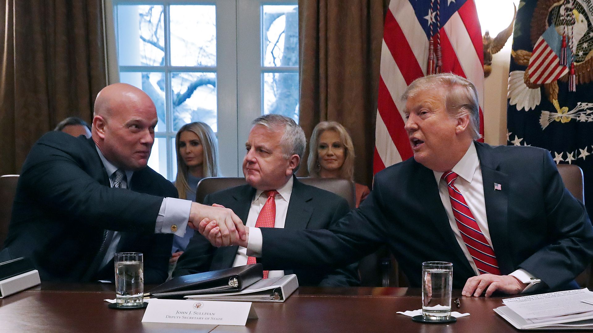 Matt Whitaker shaking Trump's hand