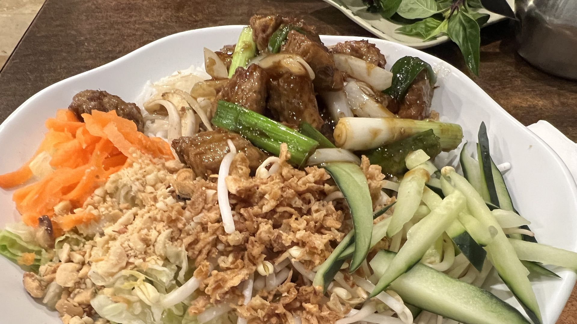 Photo of a bowl of vegetables and tofu. 