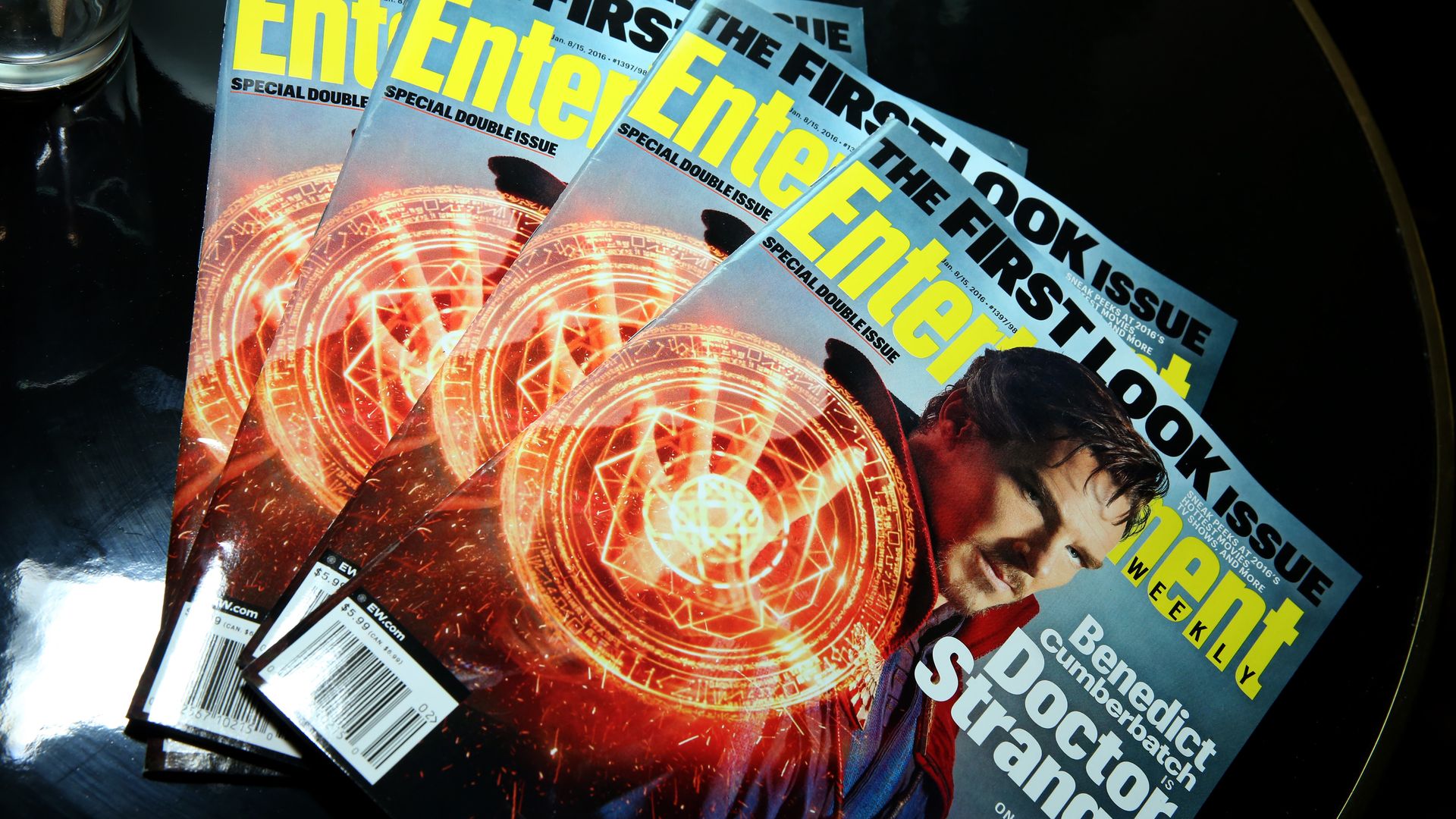 Several magazines are piled on top of each other