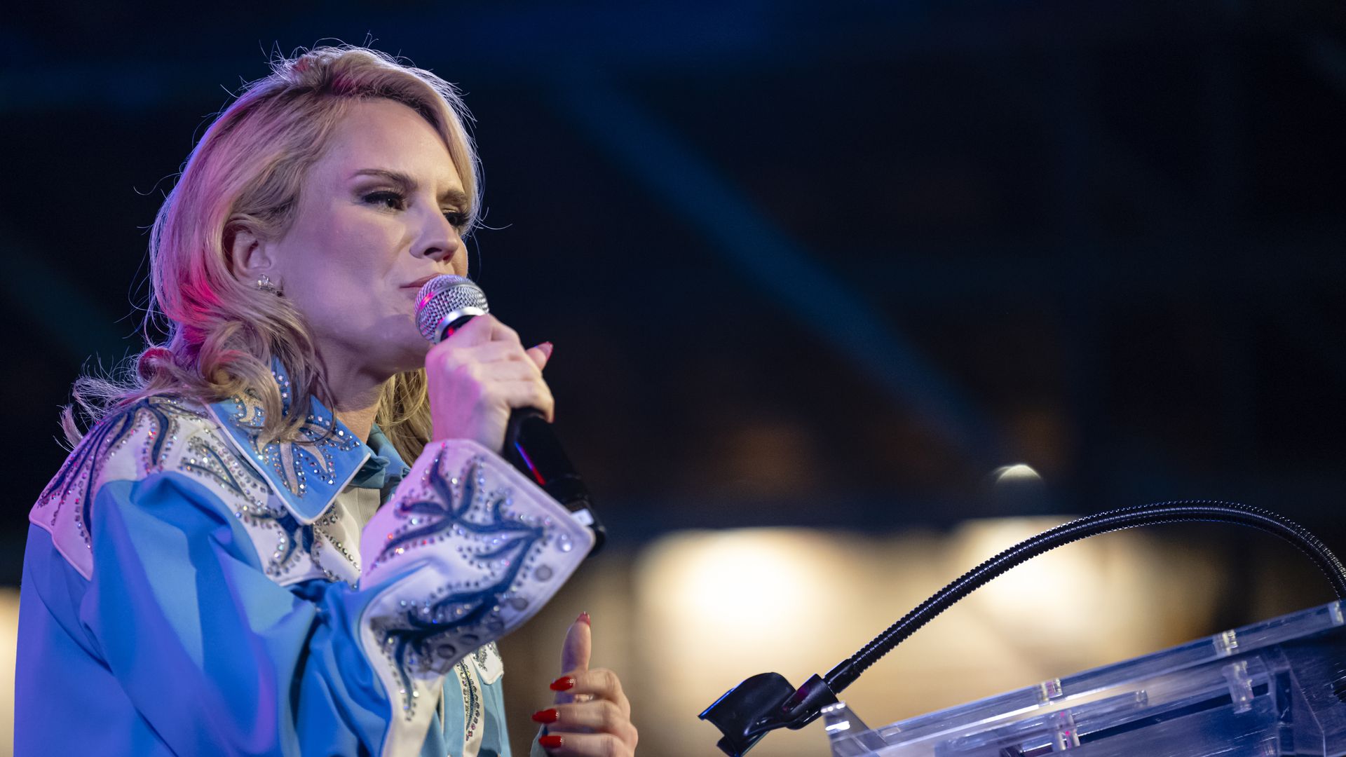 State Rep. Aftyn Behn addresses supporters at her watch party last month for the U.S. House District 7 special election.