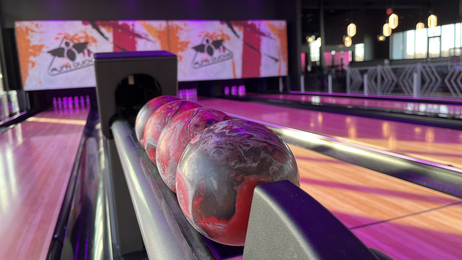 Duckpin bowling balls and an alley