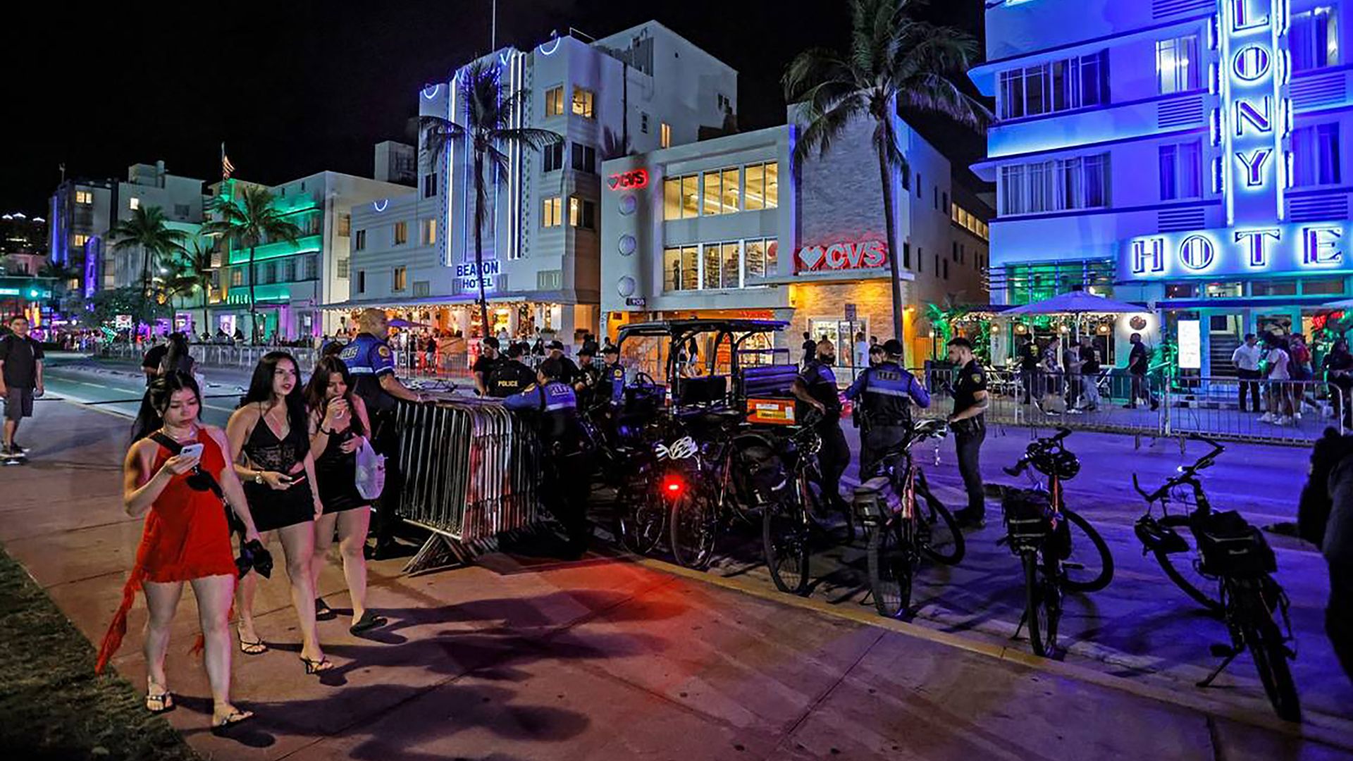 South Beach visitors walk along Ocean Drive during spring break in Miami Beach, Florida, on Saturday, March 9, 2024.