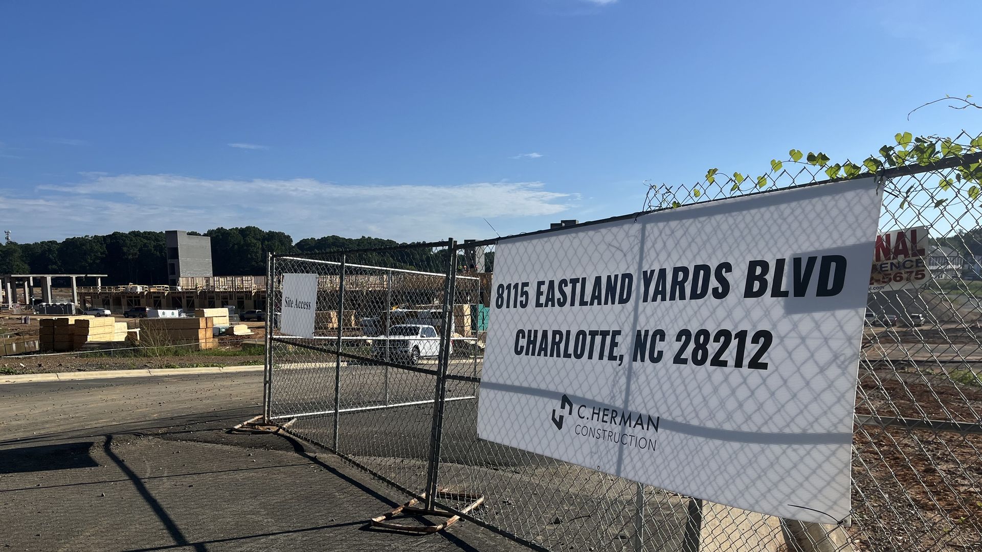 Eastland Yards gate and sign in front of construction site