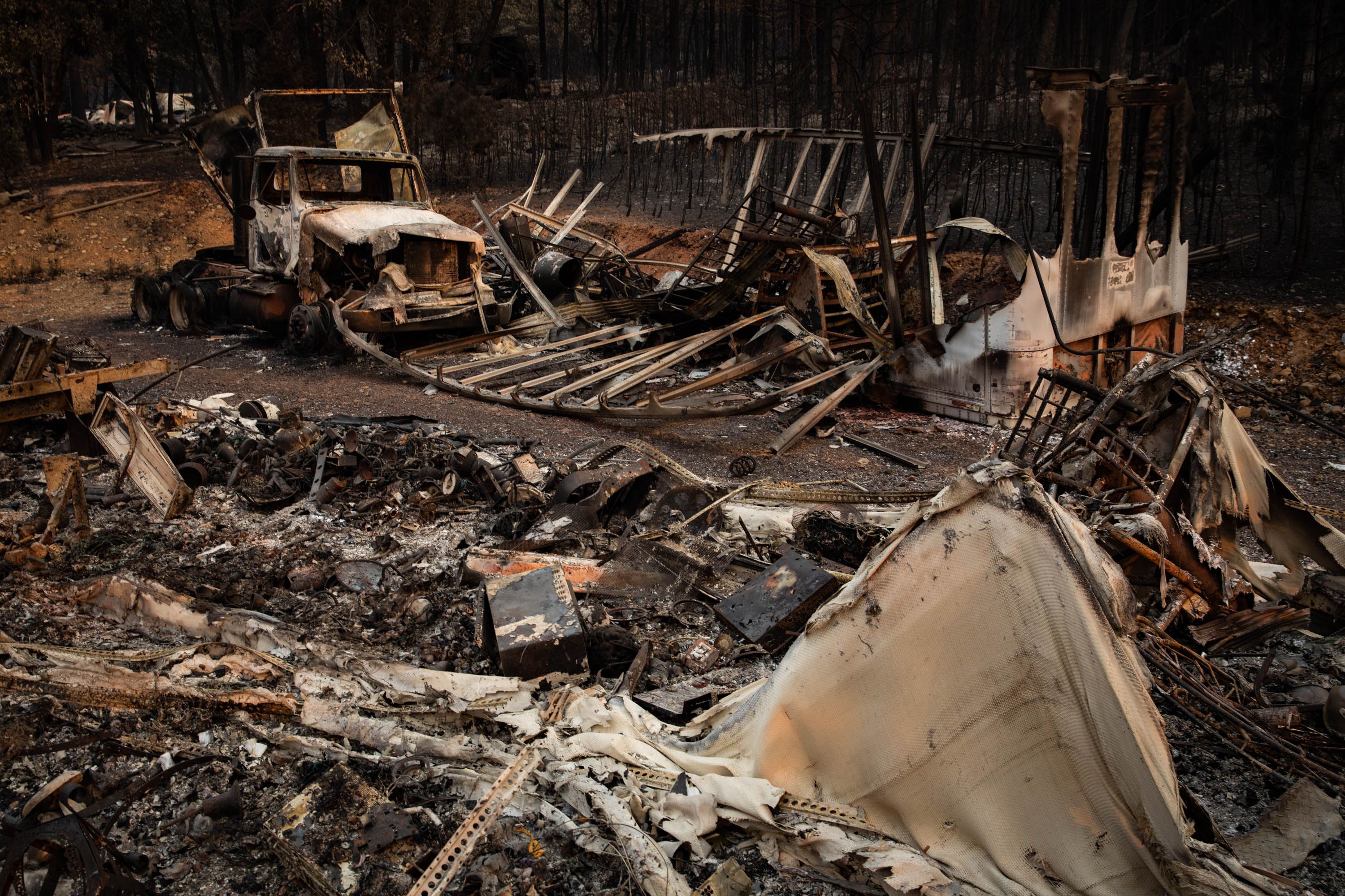 A home and garage destroyed by the Dixie Fire 