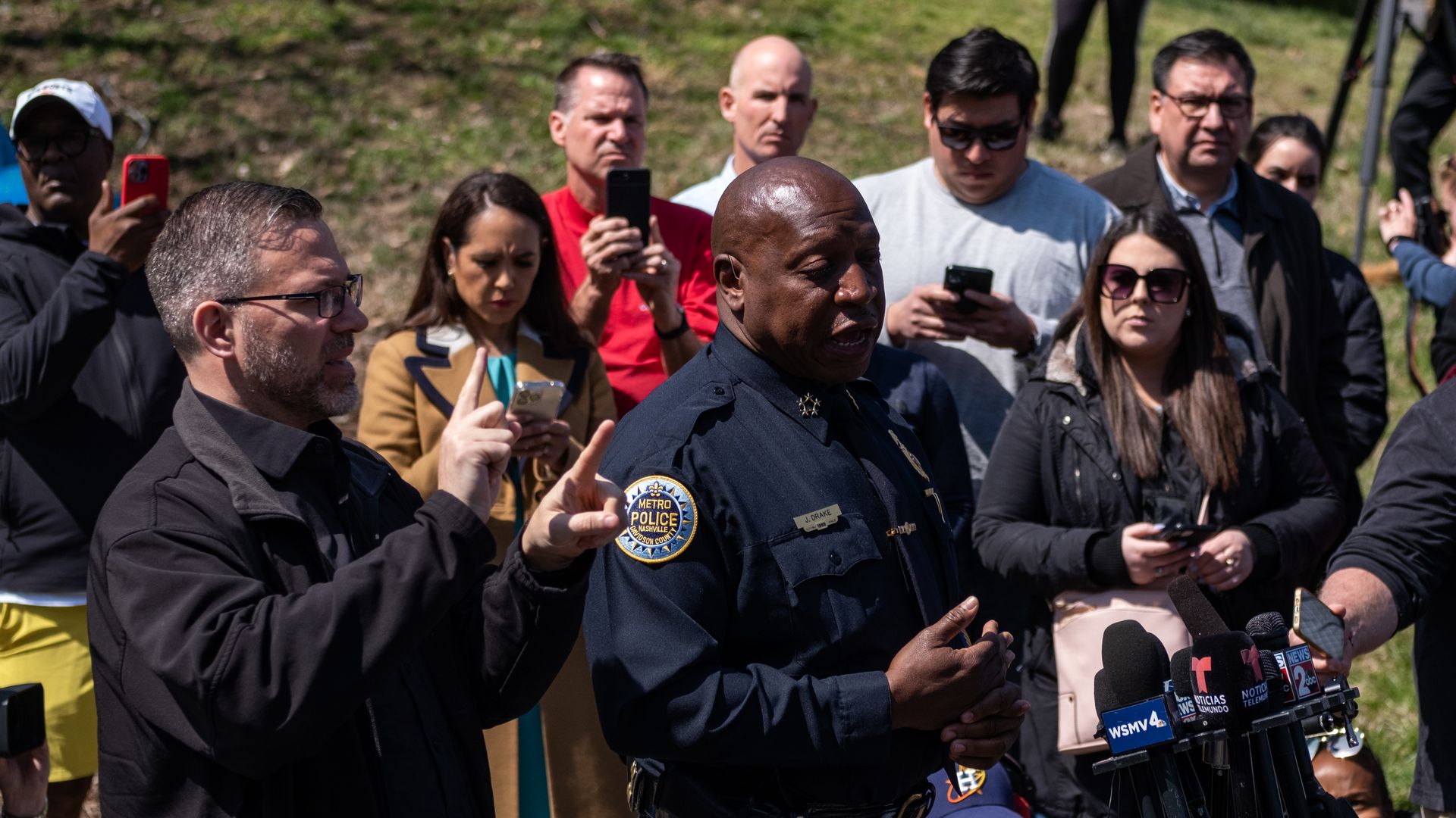 Chief of Police John Drake delivers a press briefing at the entrance of The Covenant School.