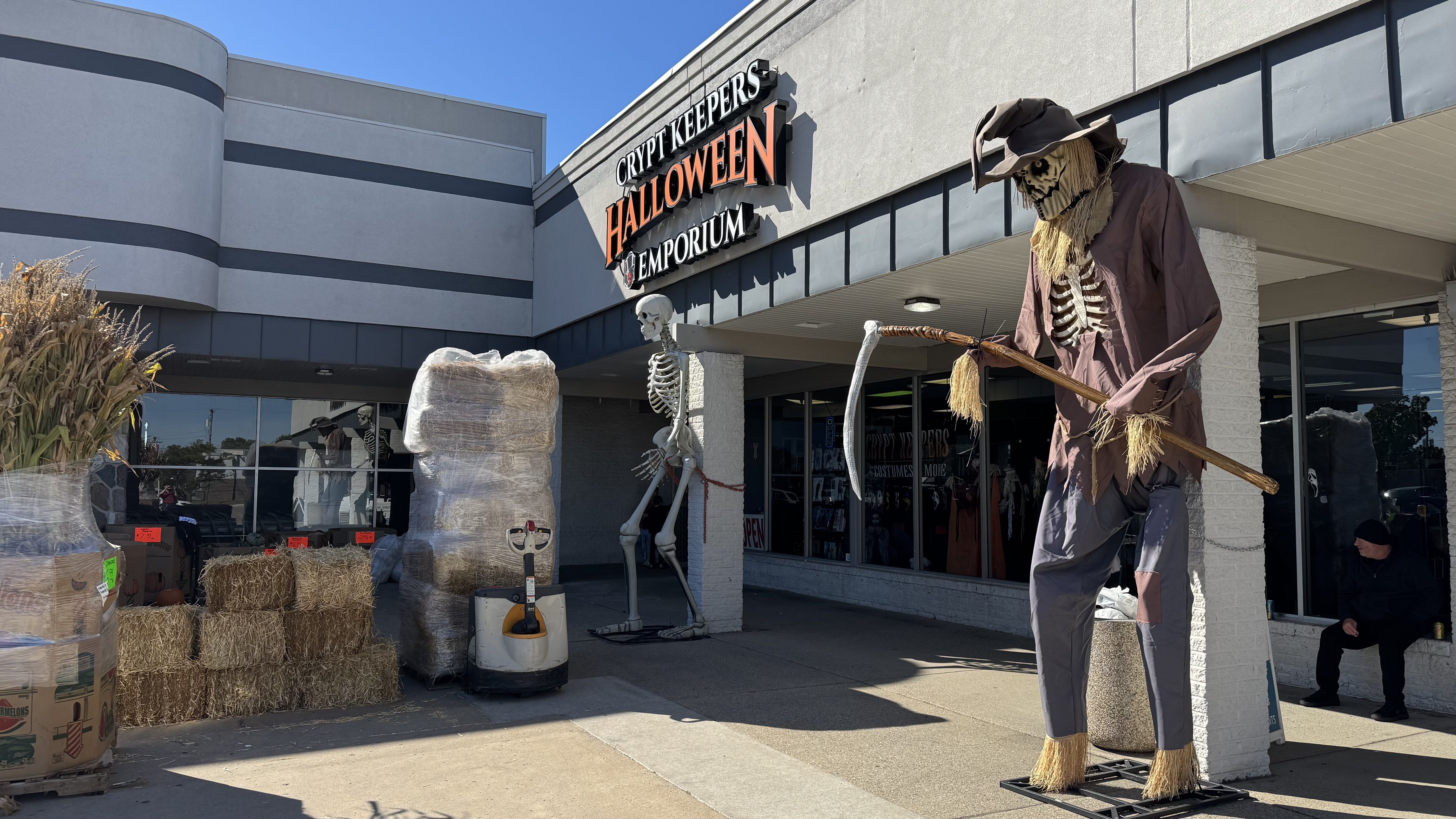 The front of the store, with a huge skeleton in front