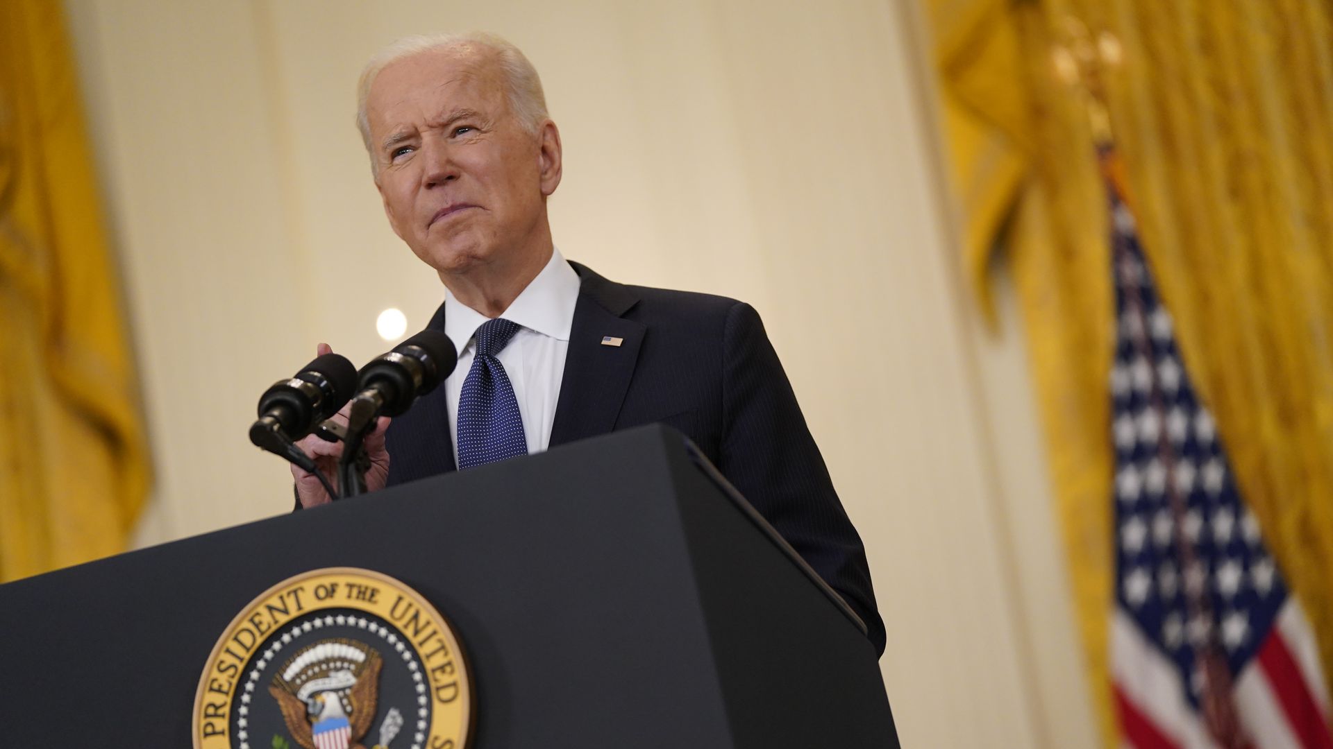 Picture of Joe Biden standing behind a podium