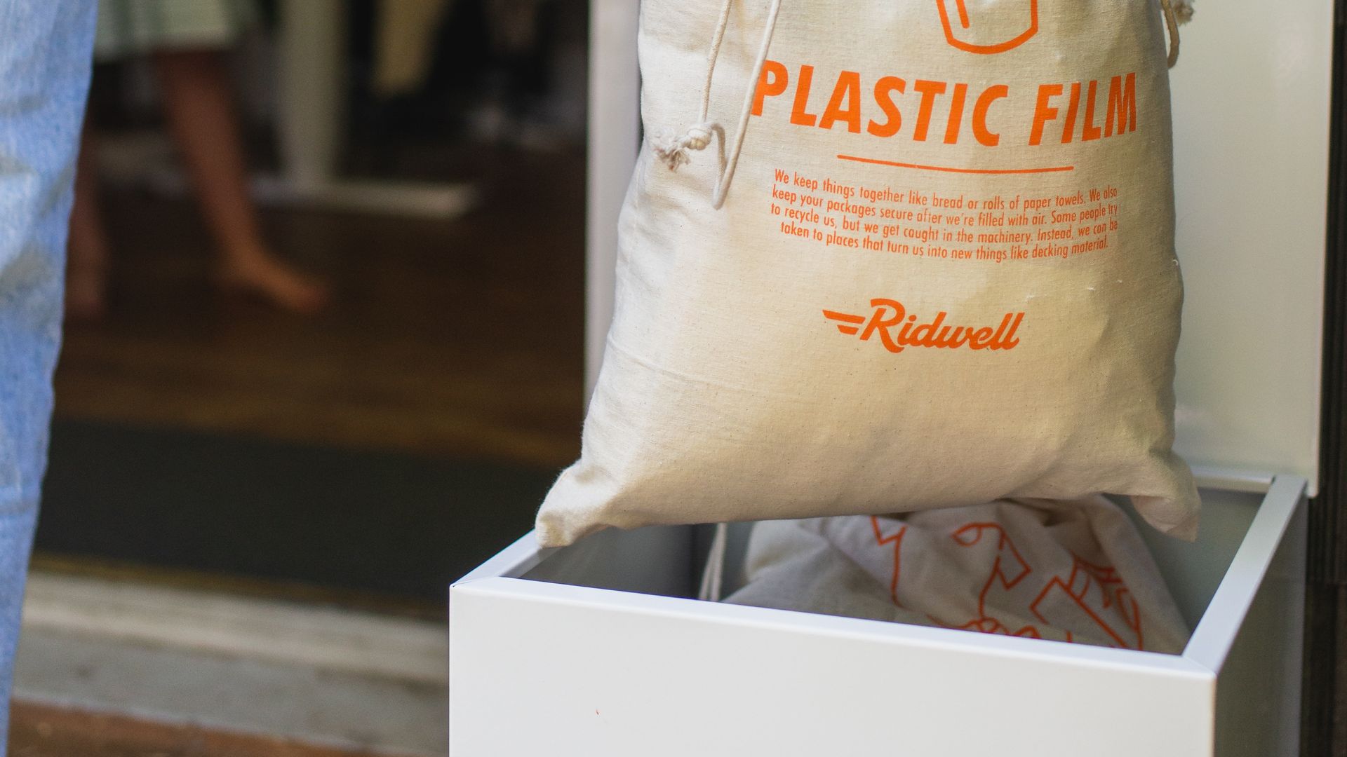 The white pickup box of Ridwell, a recycling company.