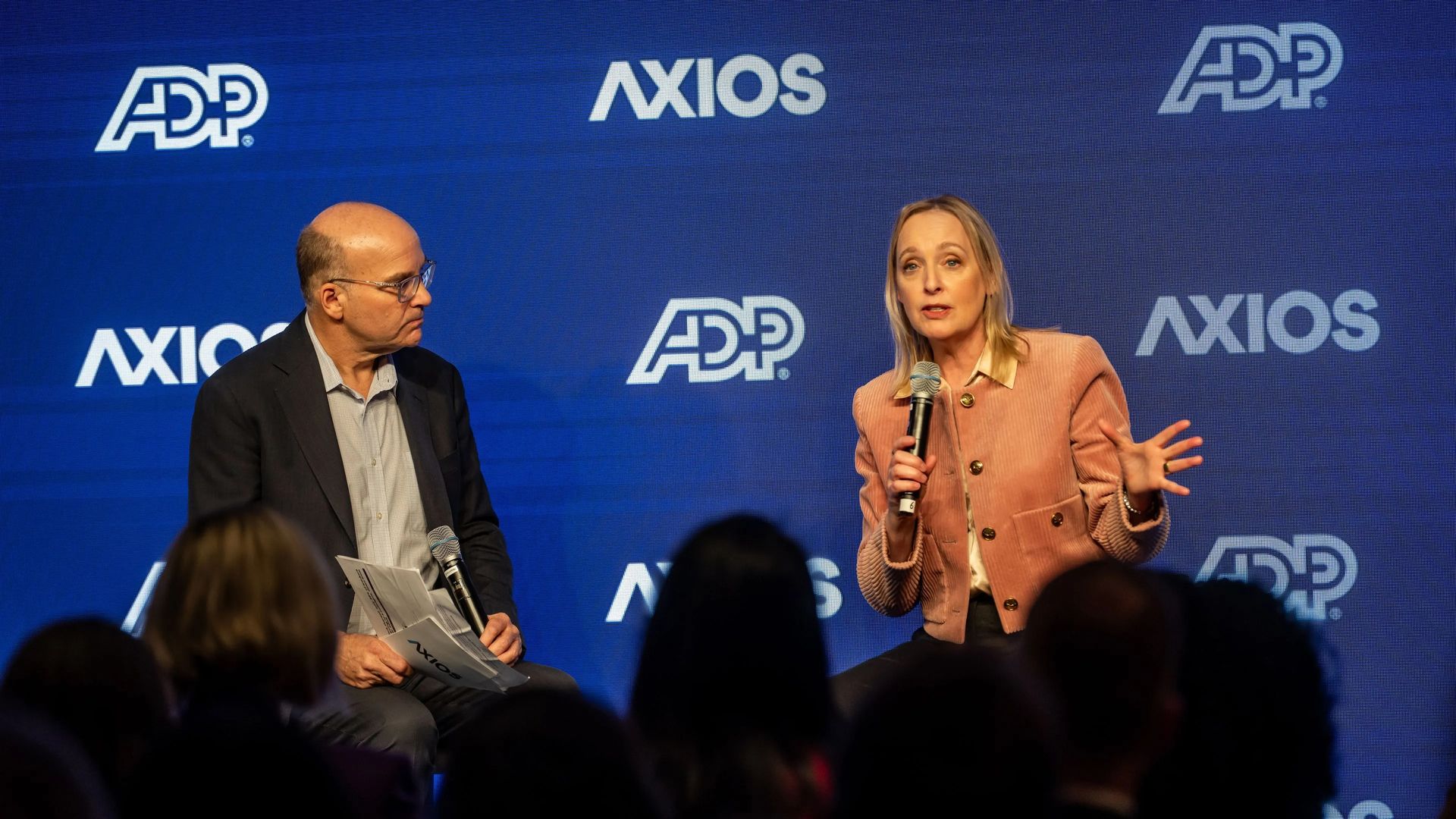 Axios' Mike Allen interviews Accenture CEO Julie Sweet in Davos yesterday. Photo: Dani Ammann Photography for Axios