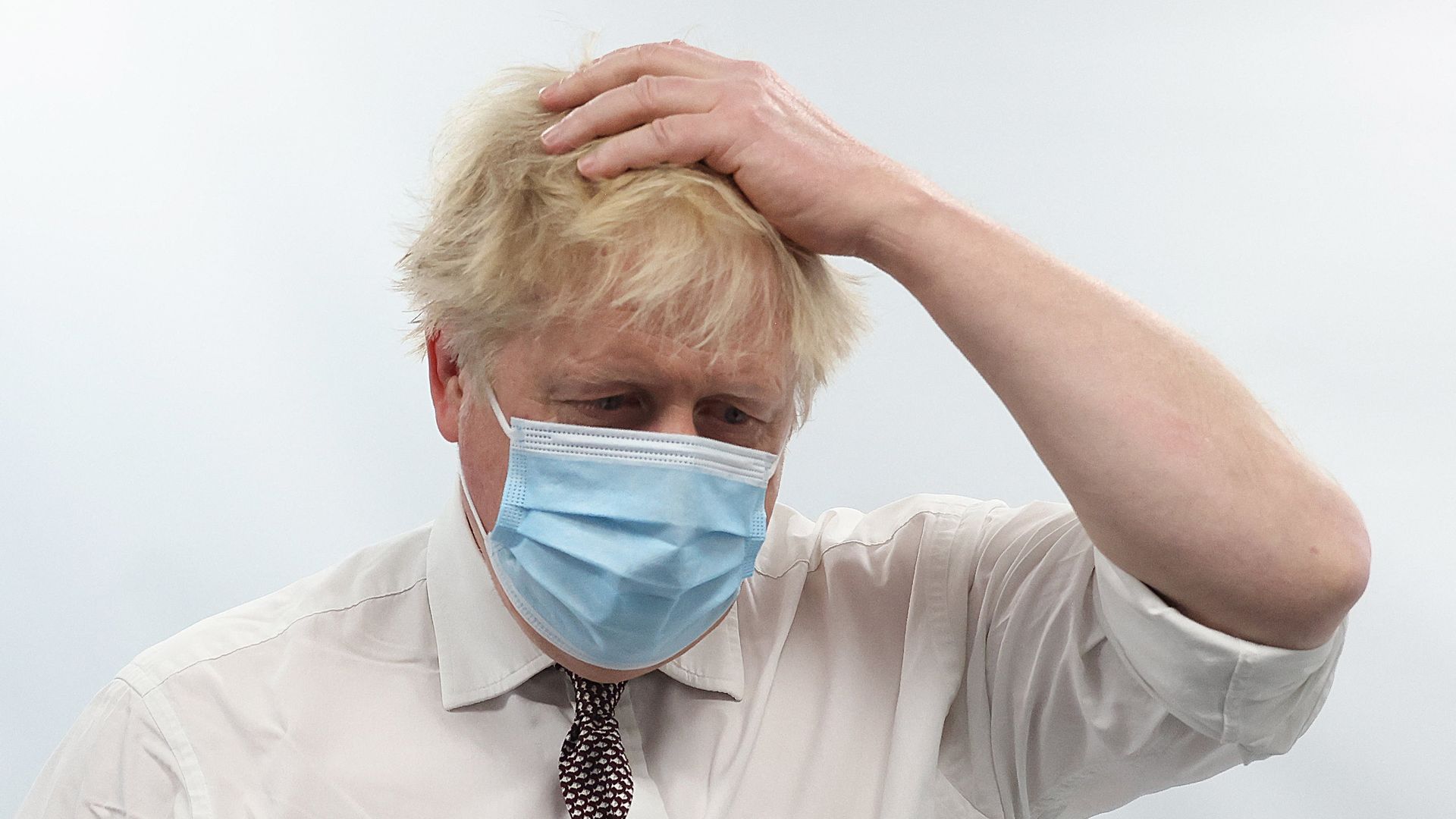 British Prime Minister Boris Johnson gestures as he visits Finchley Memorial Hospital in North London on January 18.