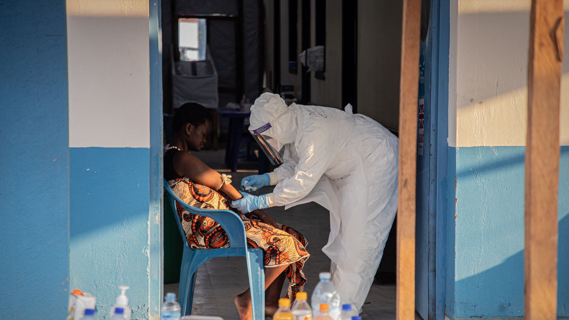 Health worker takes Ebola samples in Congo