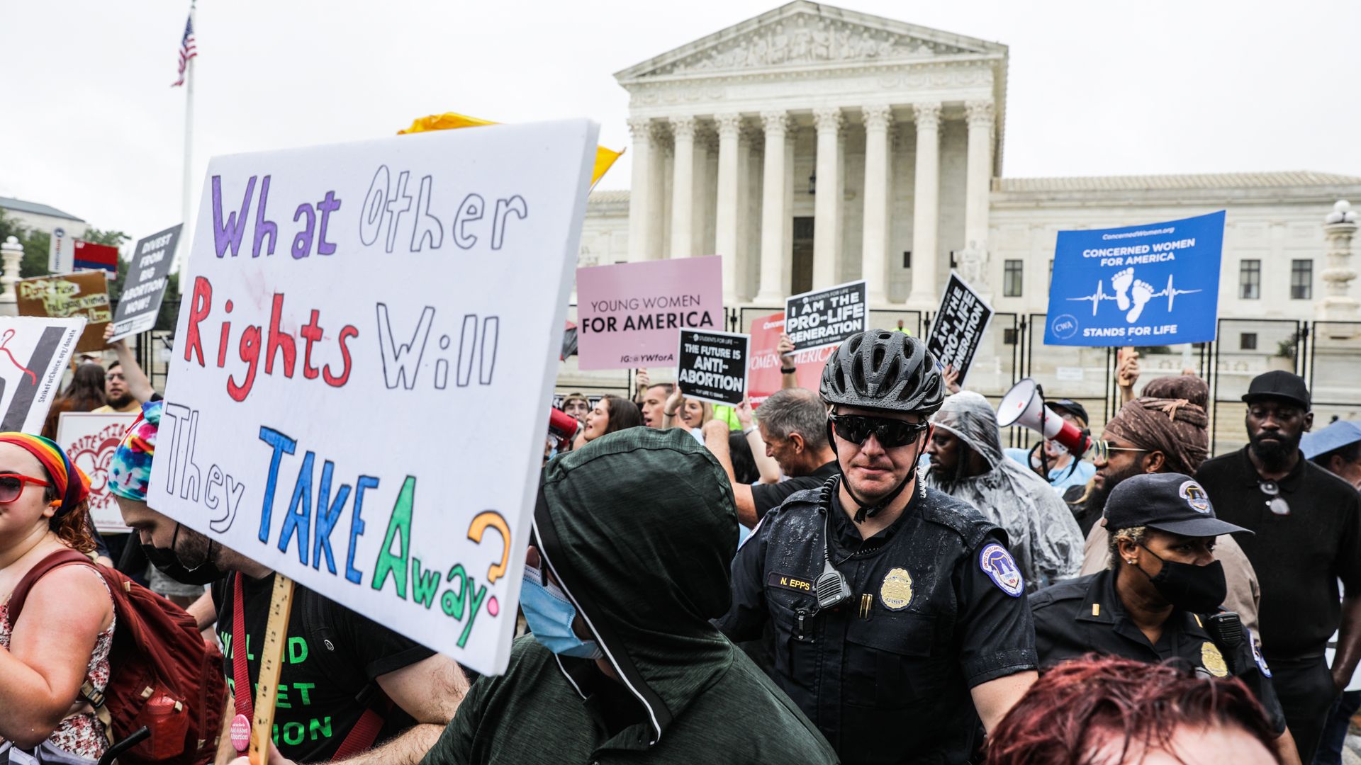 Abortion rights and anti-abortion demonstrators outside the Supreme Court on June 23.