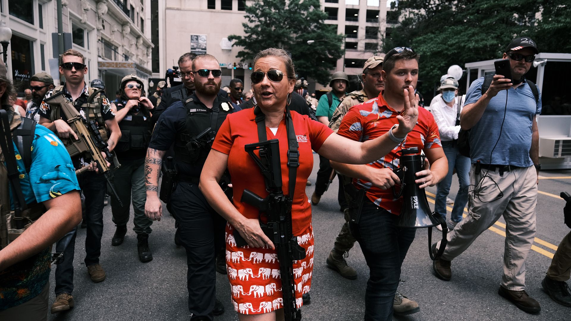 Amanda Chase surrounded by people at an open carry protest