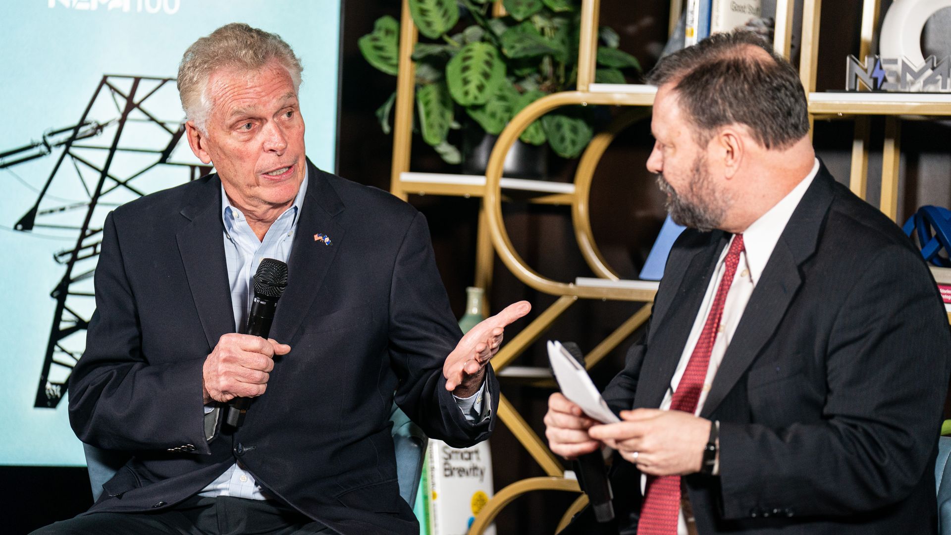 Terry McAuliffe, Former governor of the Commonwealth of Virginia, speaks to Axios' Chuck McCutcheon on stage.