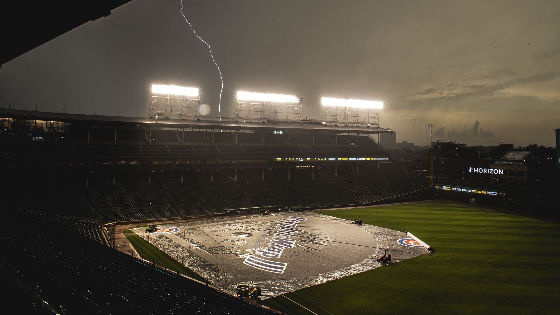 Caption: Lightning strikes over Wrigley Field last night. Photo: Matt Thomas/San Diego Padres/Getty Images