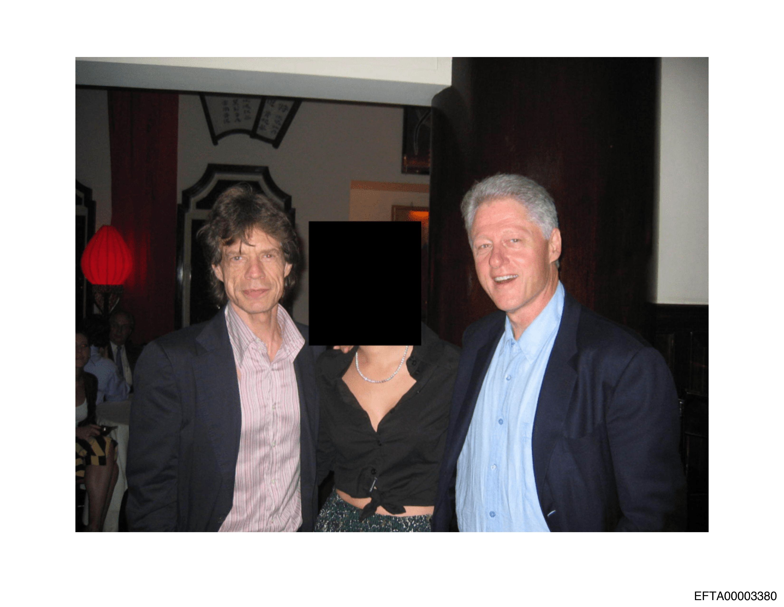 Mick Jagger and former President Bill Clinton shown together in a handout photo released by the U.S. Justice Department as part of the Epstein case records.