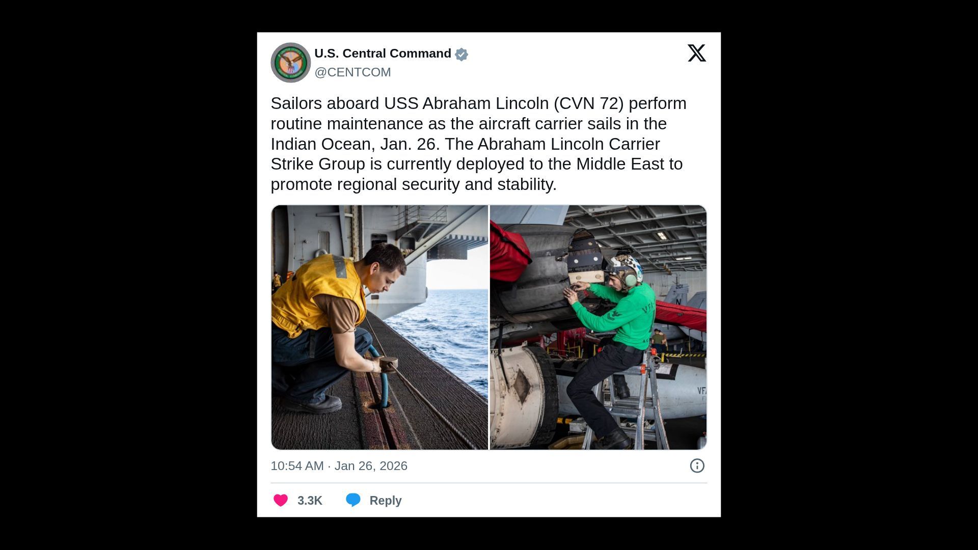 Tweet from U.S. Central Command shows sailors performing maintenance on USS Abraham Lincoln in the Indian Ocean. One's in a yellow vest by rail, another's in a green shirt working on aircraft inside hangar.