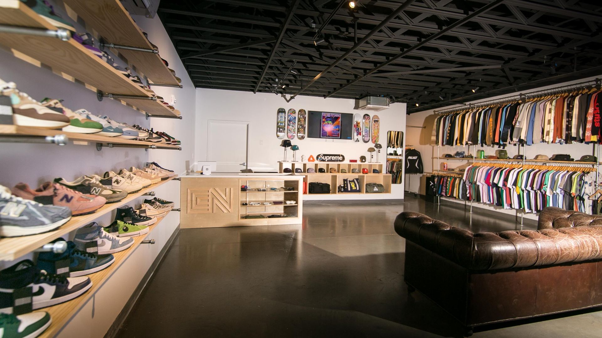 A rendering of shoe and clothing racks in a store