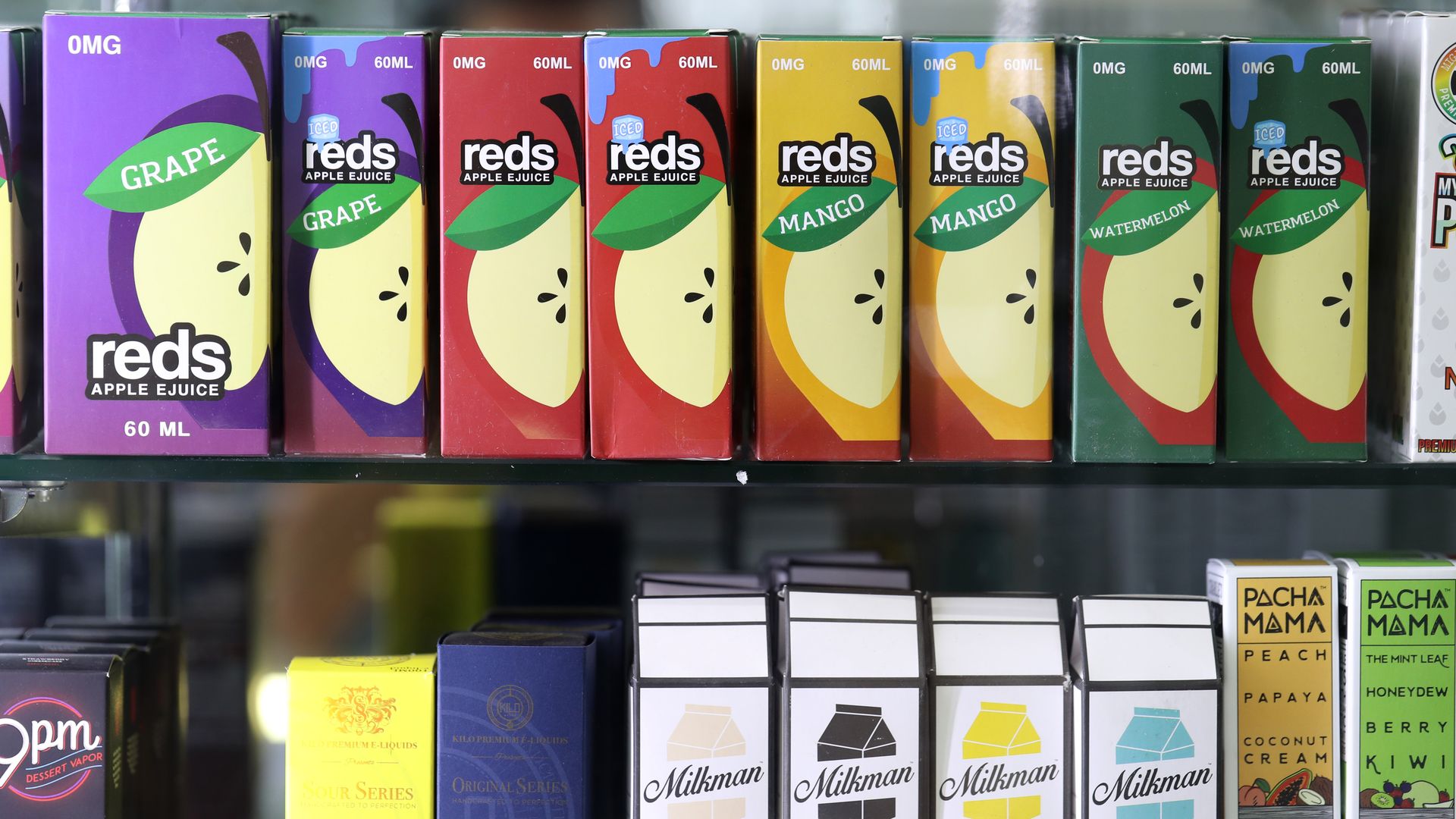 E-juice, used in e-cigarette vaporizers, is displayed at Smoke and Gift Shop on June 25, 2019 in San Francisco, California.