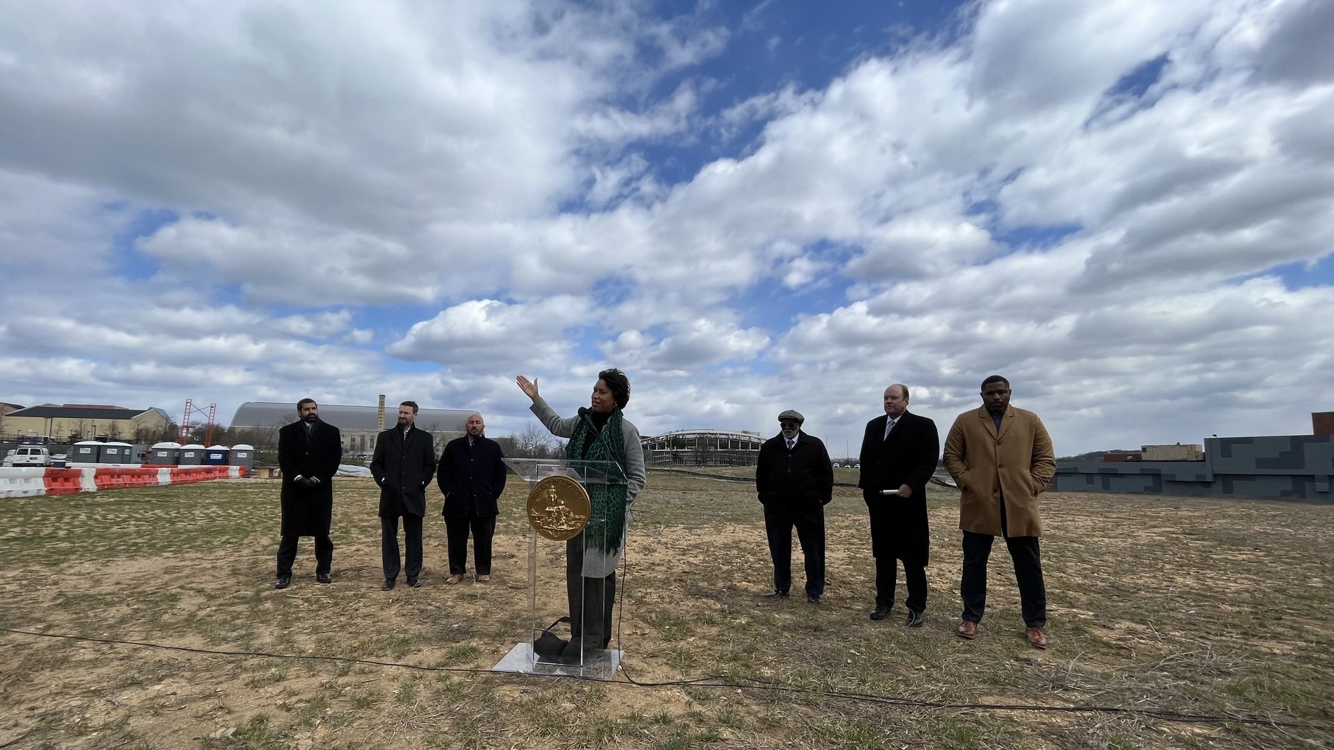 Mayor Muriel Bowser holds a press conference on land the city plans to develop into new homes and retail, south of the RFK Stadium site.