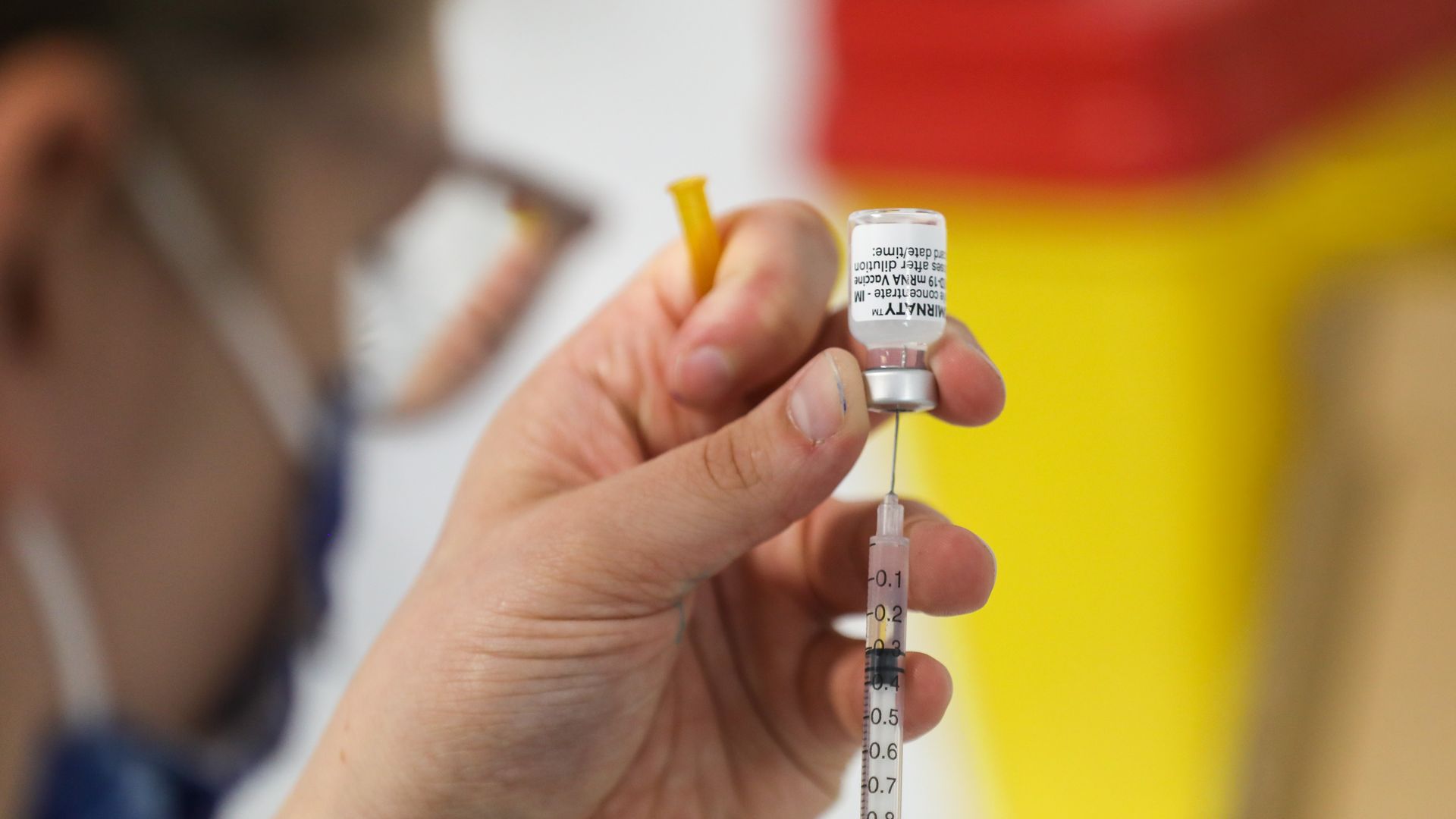 A health worker prepares a dose of the vaccine against Covid-19 coronavirus.