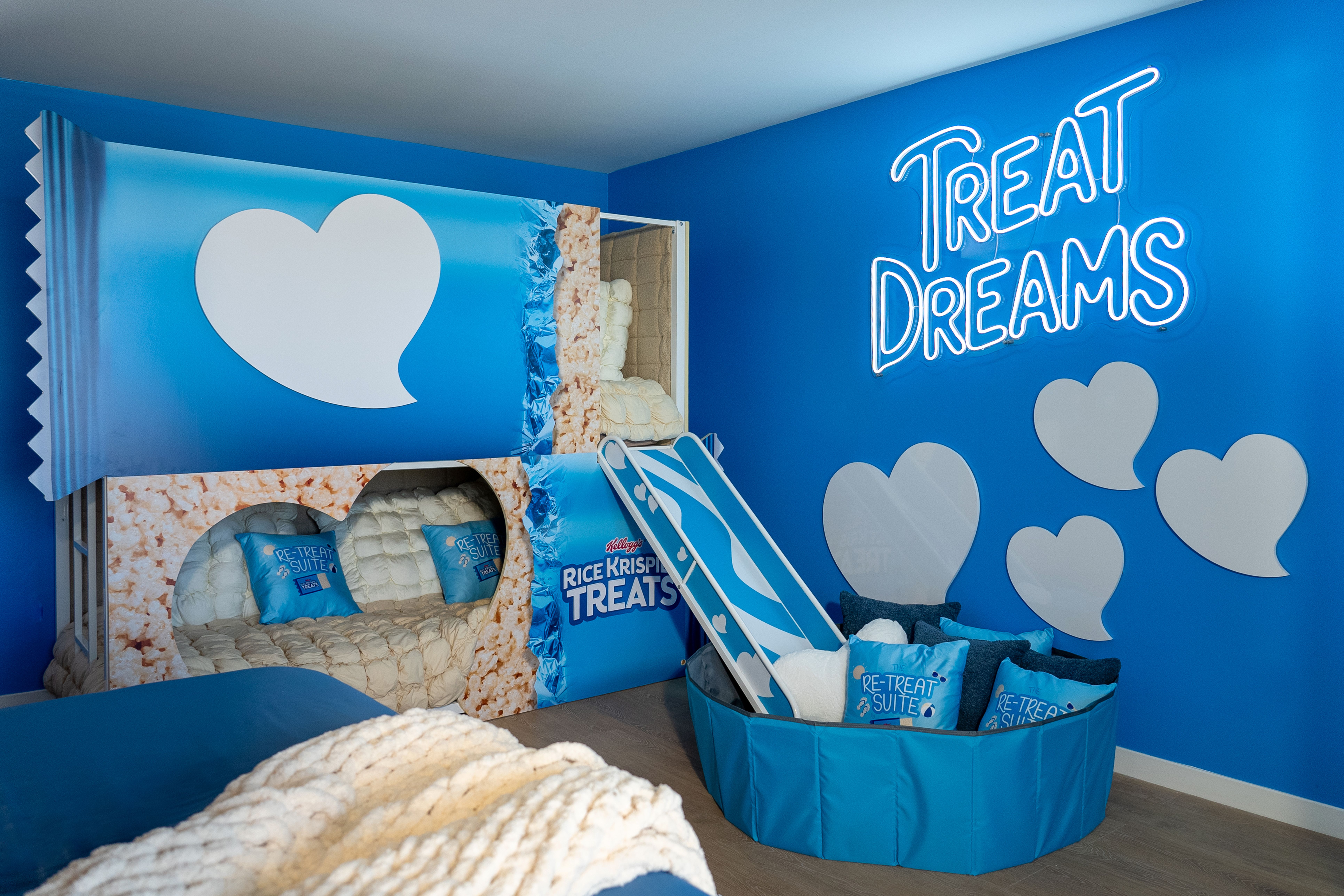 One room in the "Rice Krispies Treats Retreat" suite has bunk beds with a slide and ball pit.