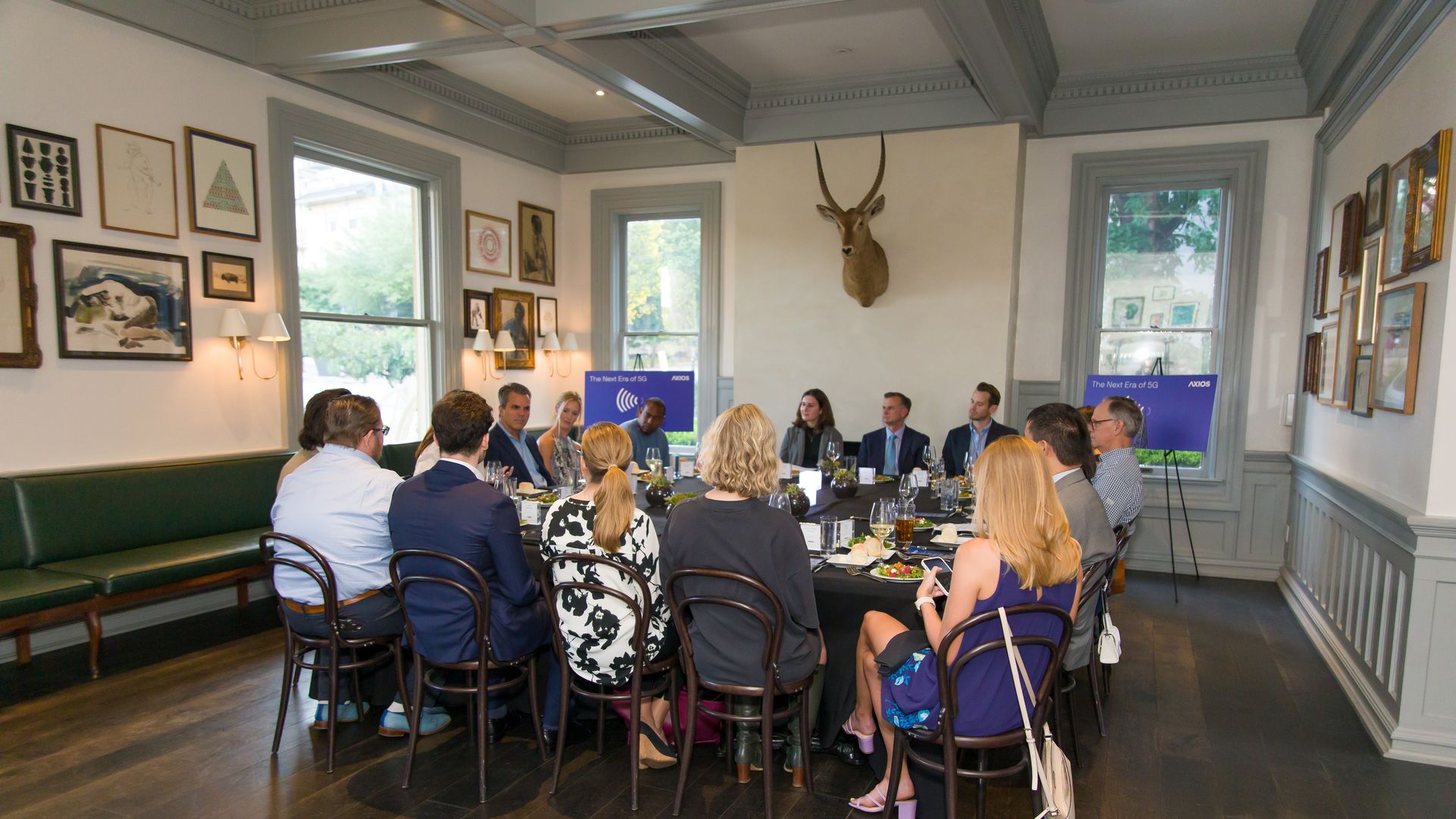Participants enjoyed a seated dinner during the discussion.
